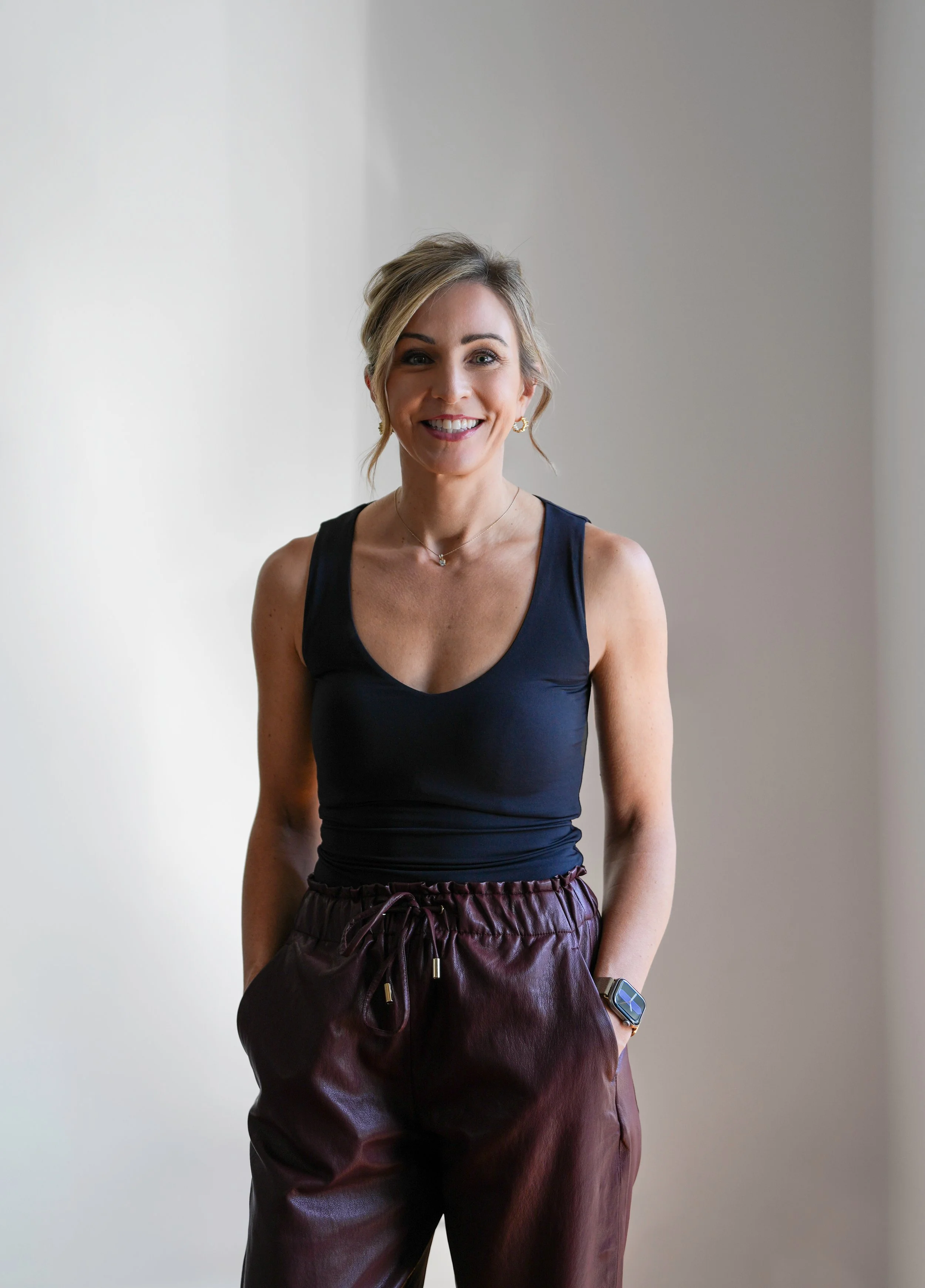 Portrait featuring soft natural light, composed framing and neutral background