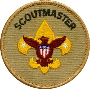 Scoutmaster patch with eagle, American flag theme, and yellow fleur-de-lis background