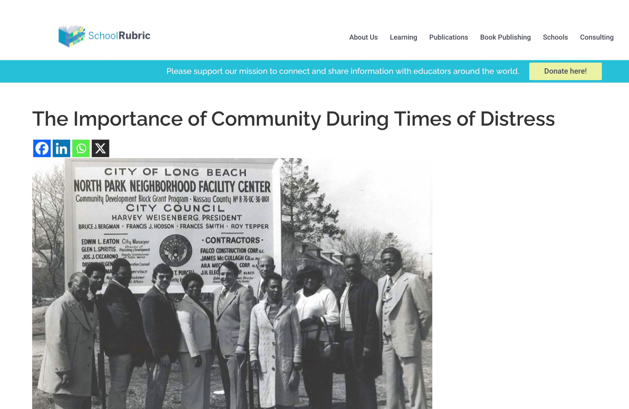 Black and white photograph of a group of ten people standing outdoors in front of a large sign that reads 'City of Long Beach North Park Neighborhood Facility Center.' The group includes men and women dressed in formal attire, and trees can be seen in the background.