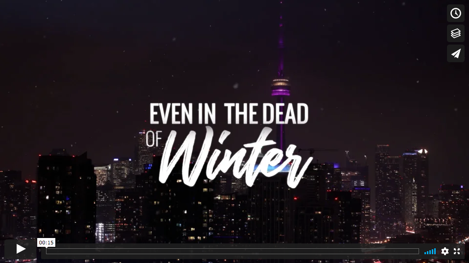 Video image of Toronto skyline with text saying "Even in the Dead of Winter"