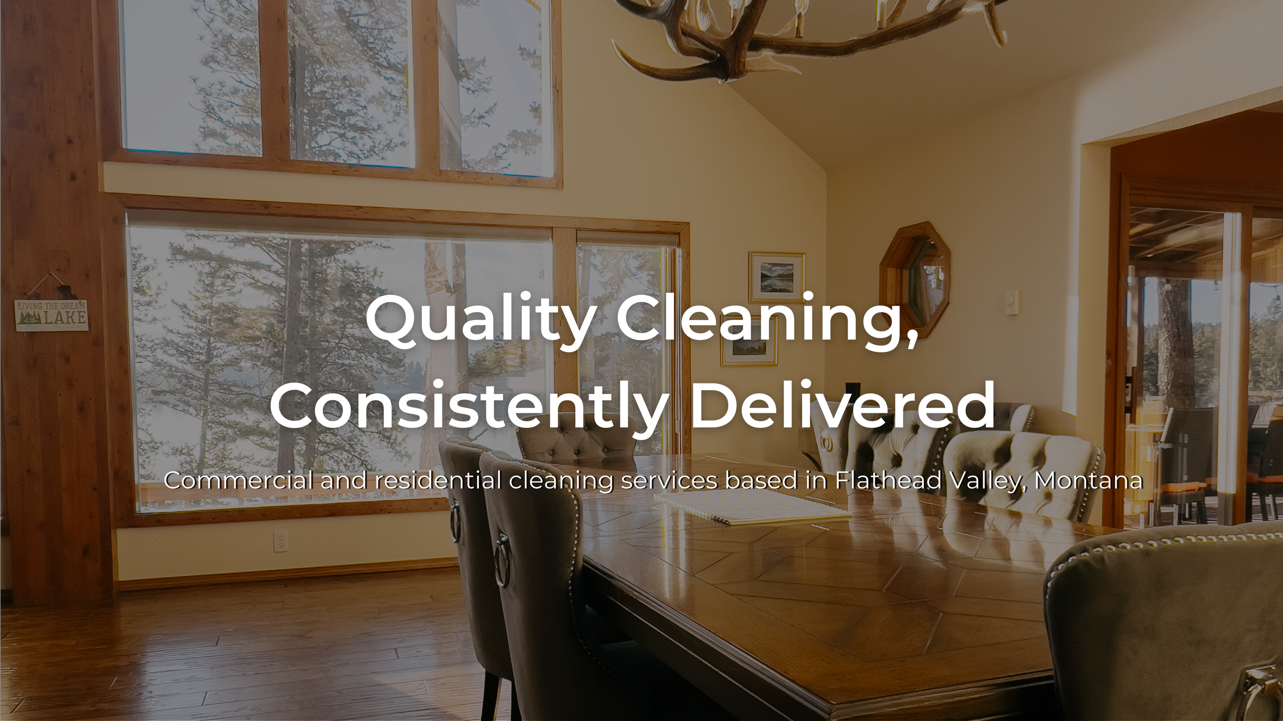 A dining room with wooden floors and large windows showing trees outside. There is a wooden table with black chairs and a chandelier hanging above. The walls are light-colored with framed pictures, and a small sign on the wall. Text overlay indicates a cleaning service advertisement.