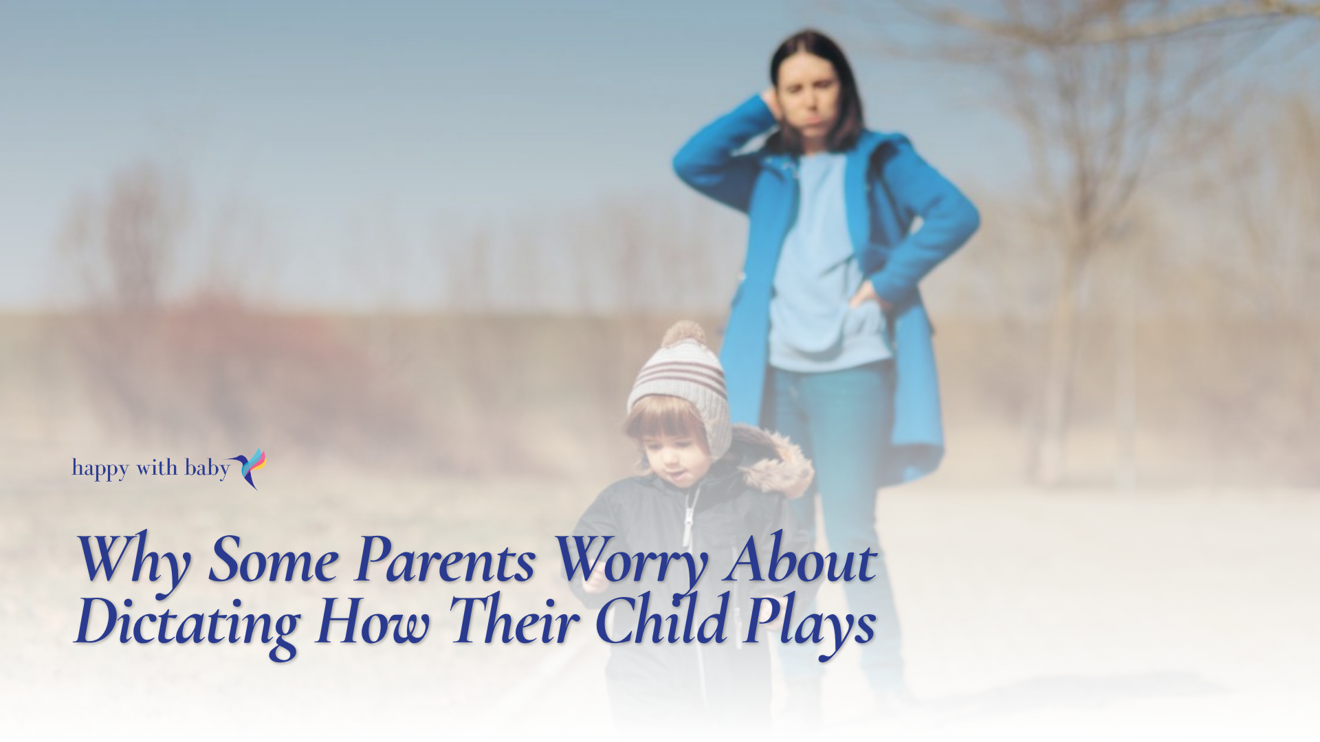Young child walking ahead on a park path while a parent stands behind watching.
