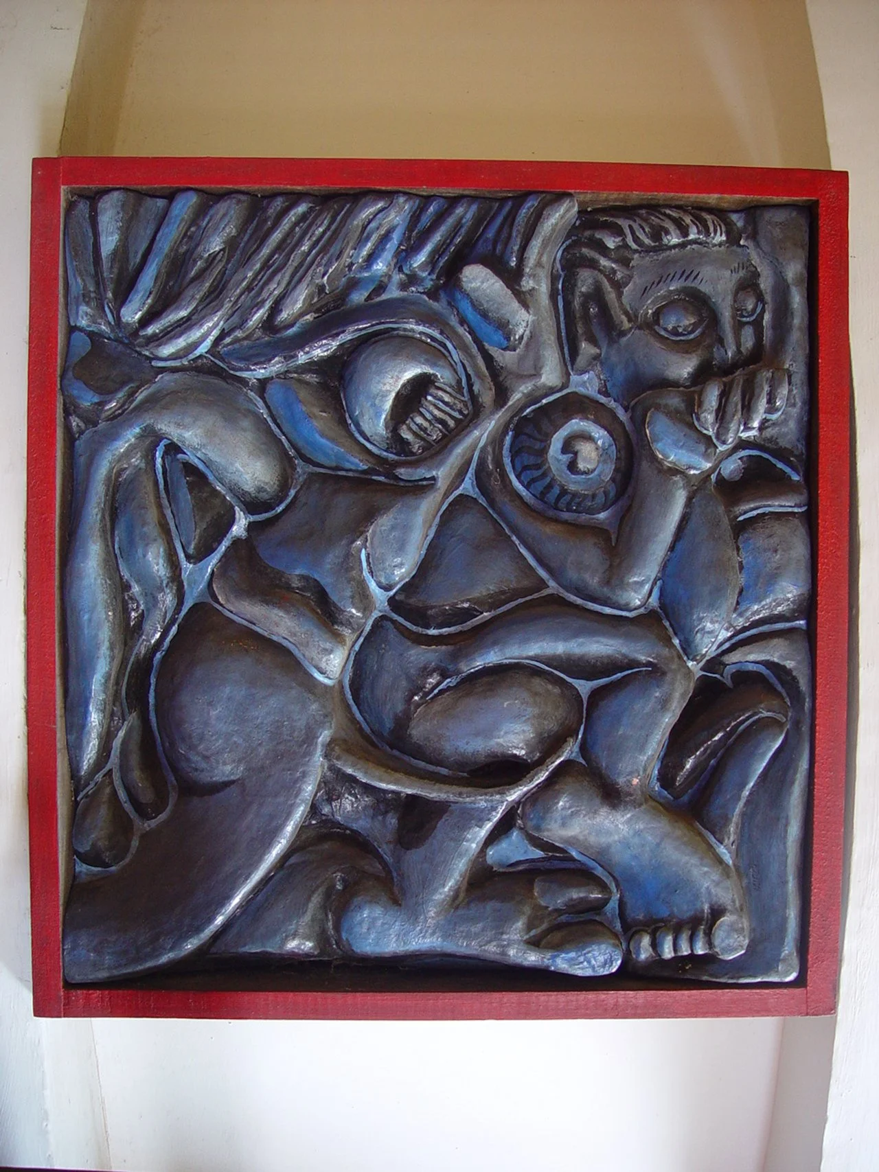 Titulo: El comediante pensador
Técnica: Poliuretano Tallado sobre madera, pintura acrílica.
Medidas: 50cm X 50cm
Año: 2003
