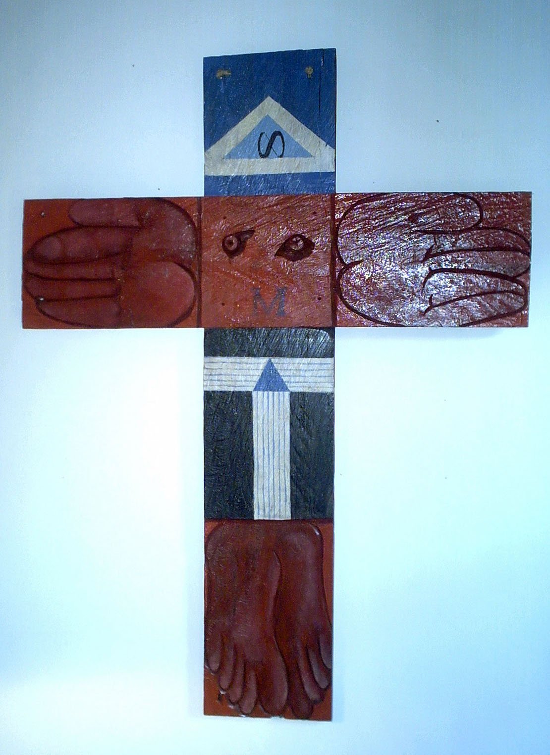 Cruz de Madera
Técnica: Talla y pintura acrílica
Medidas: 1.8m X 1.2m
Año: 2004