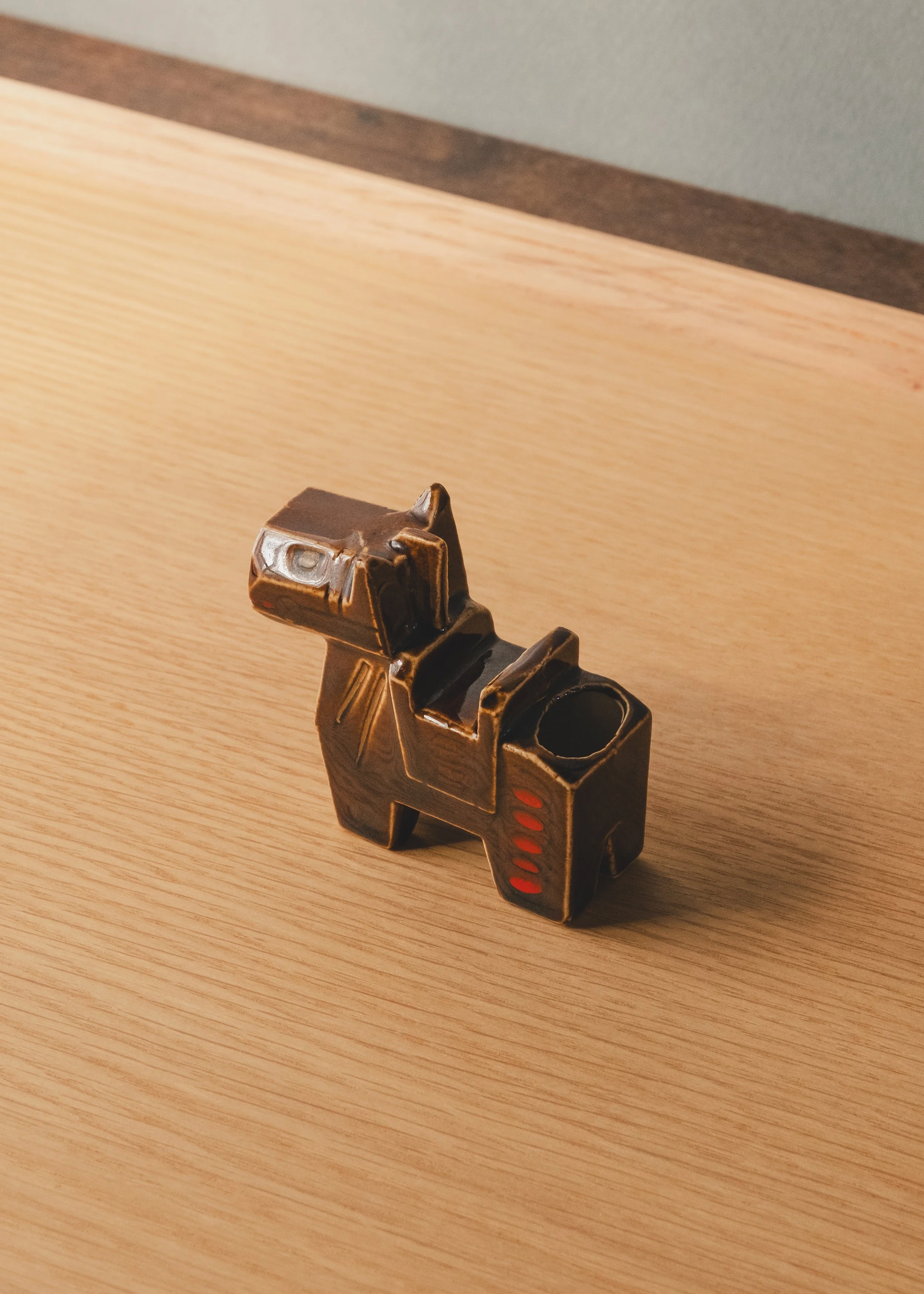 Minimalist mid-century japanese pottery horse objet d'art with hand-painted red accents.