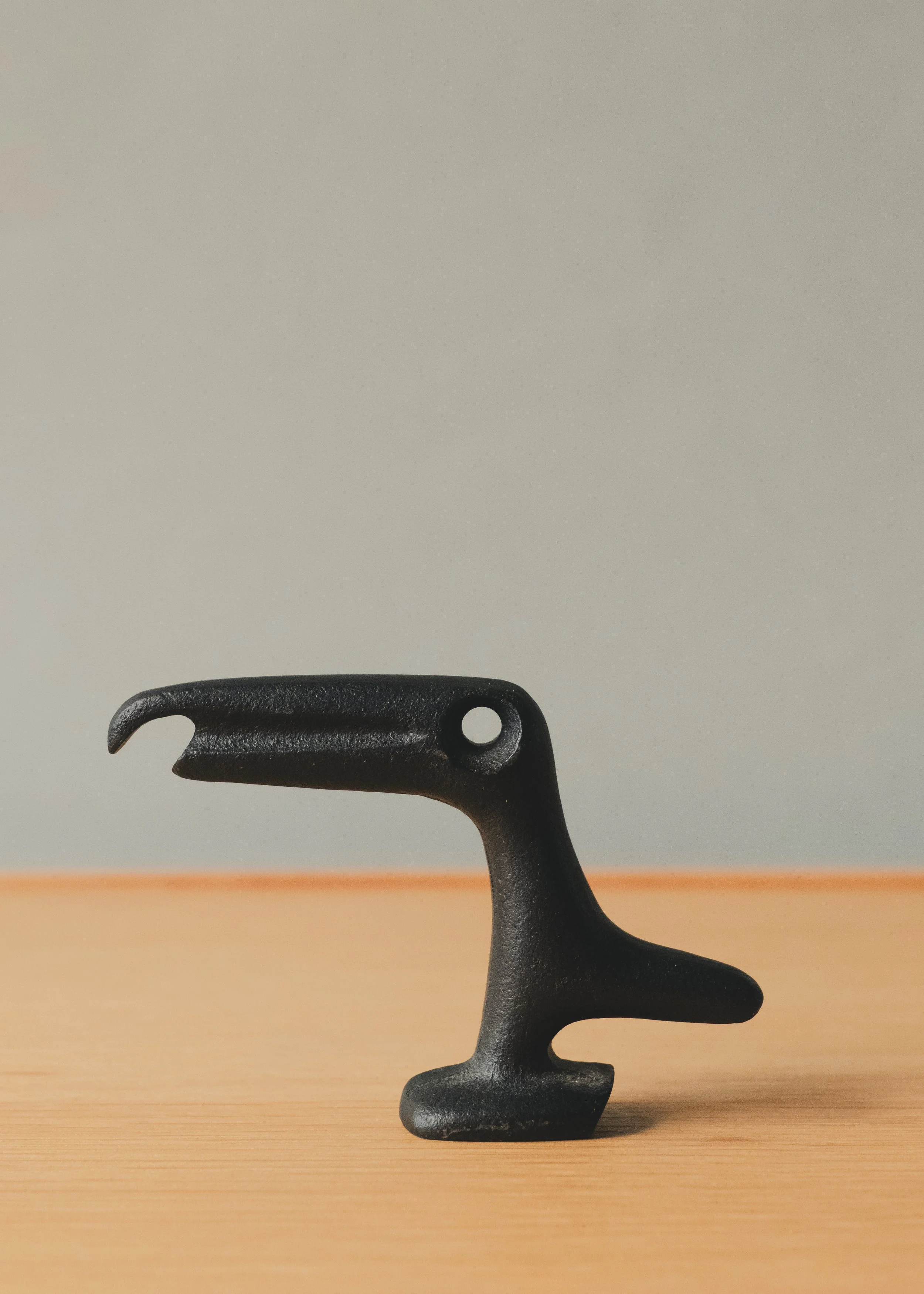 Iconic silhouette of the Japanese Raven 1970. A historical specimen where mid-century geometry meets traditional metalwork, offered exclusively by MINGEI 1926.