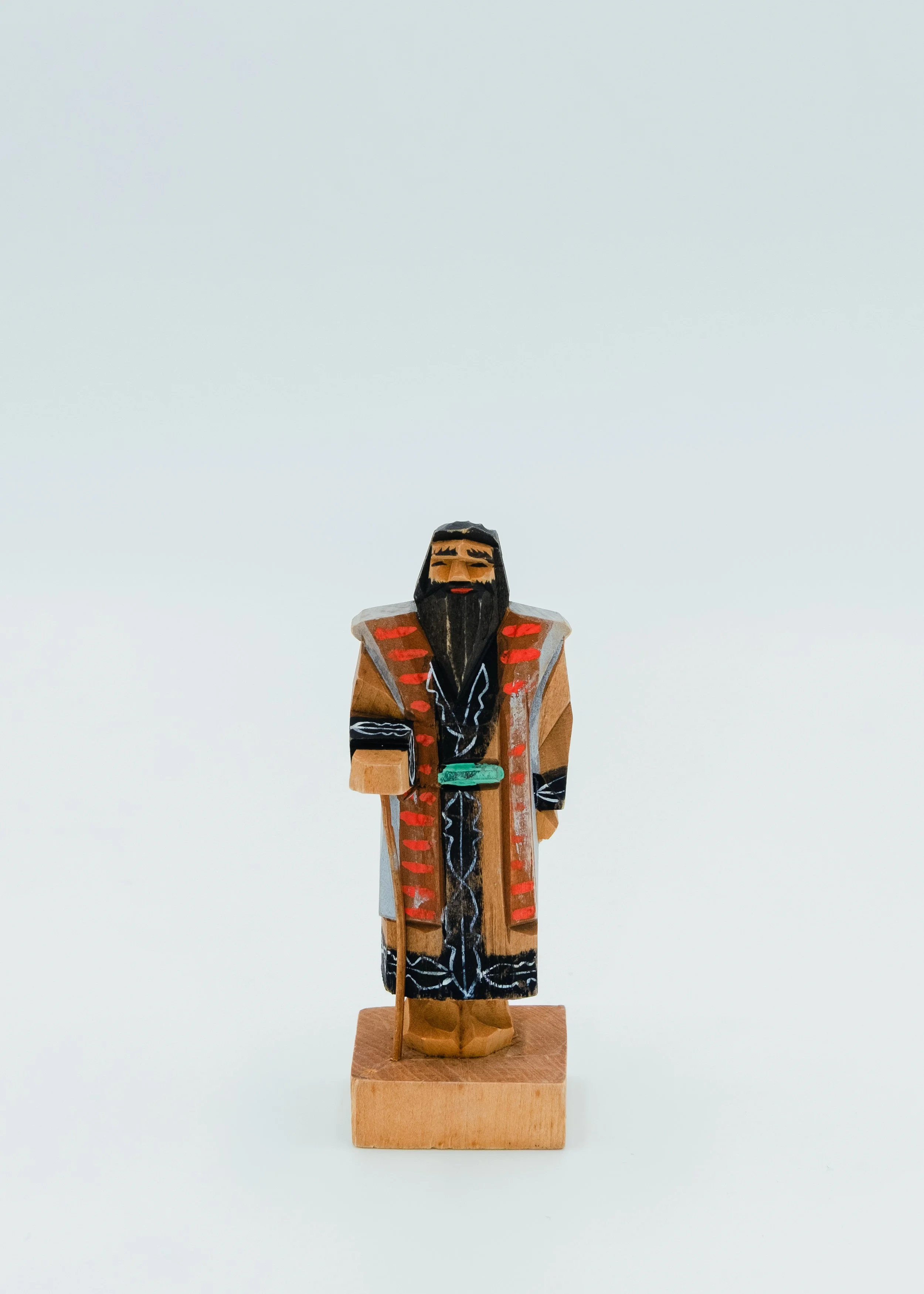 Blue painted vintage wooden Ainu doll wearing traditional clothes souvenir from Hokkaido Japan昭和retro