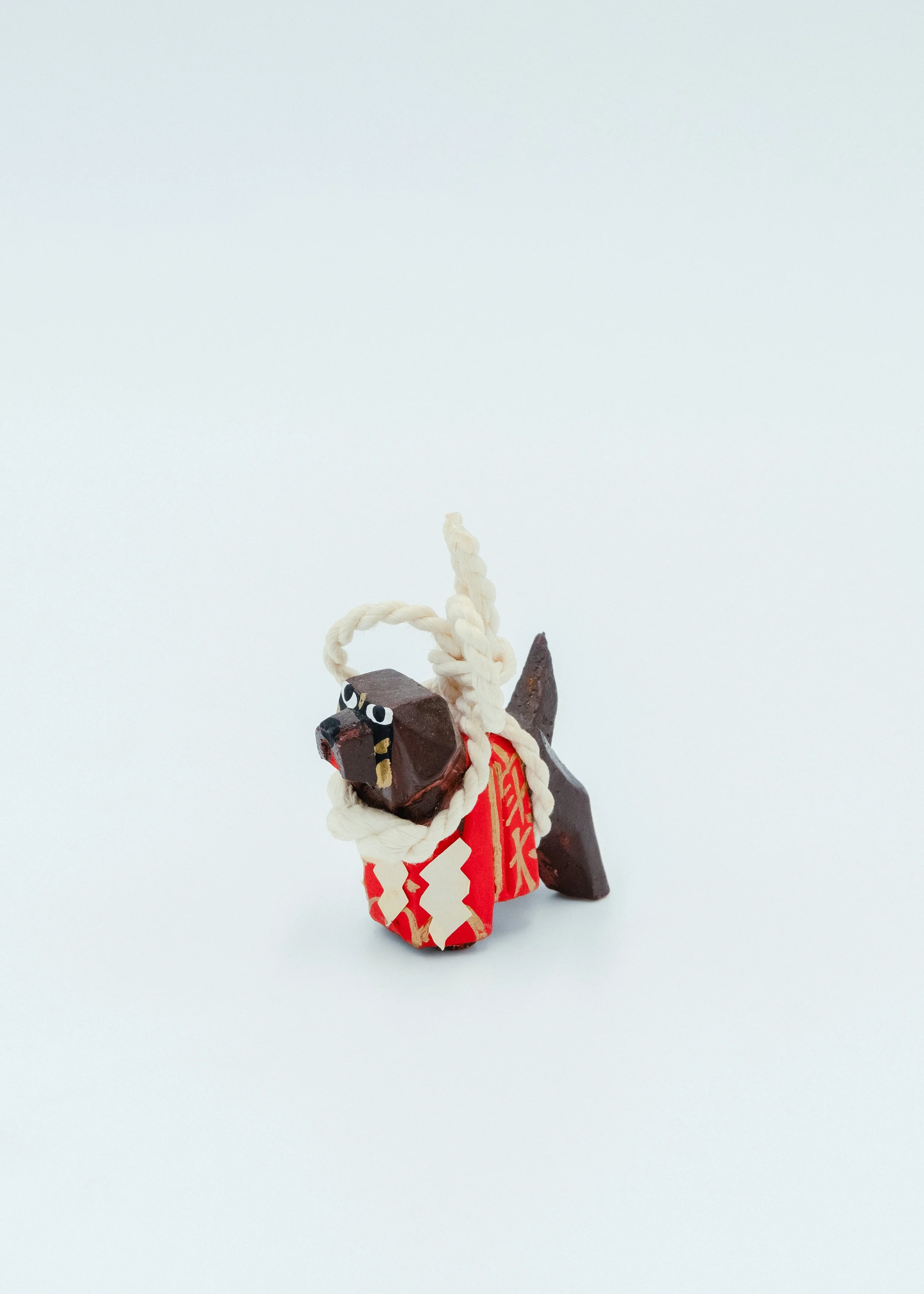 High angle view of miniature Tosa Inu wooden statue vintage Showa retro decor guardian dog object