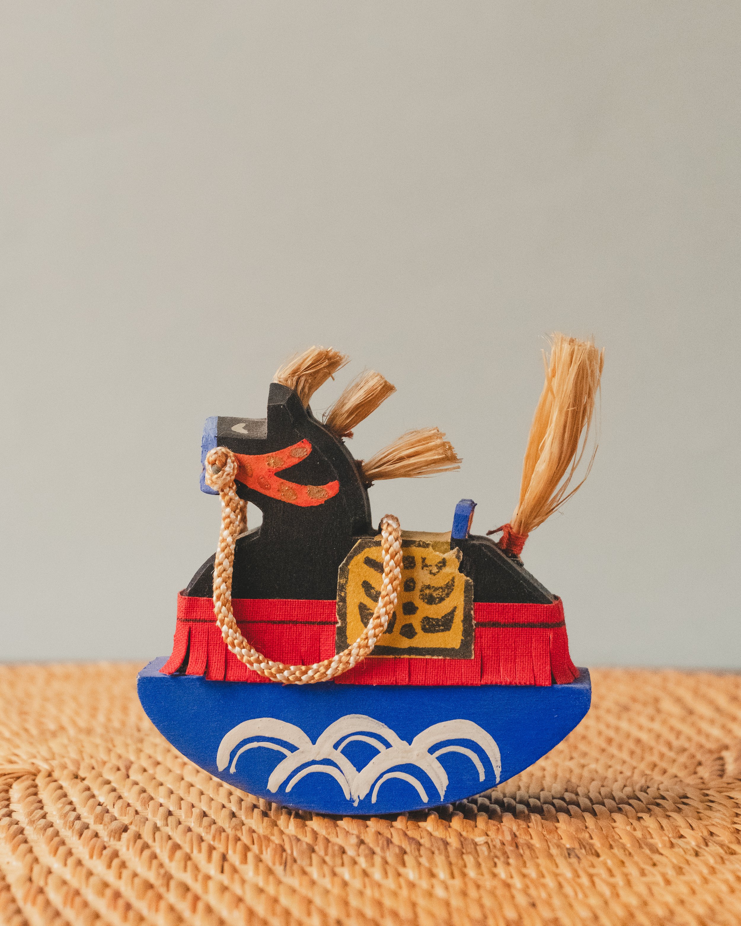 Side profile of THE VANGUARD STALLION 1930 rocking artifact. Traditional Japanese folk art horse archive from the early mid-century period.