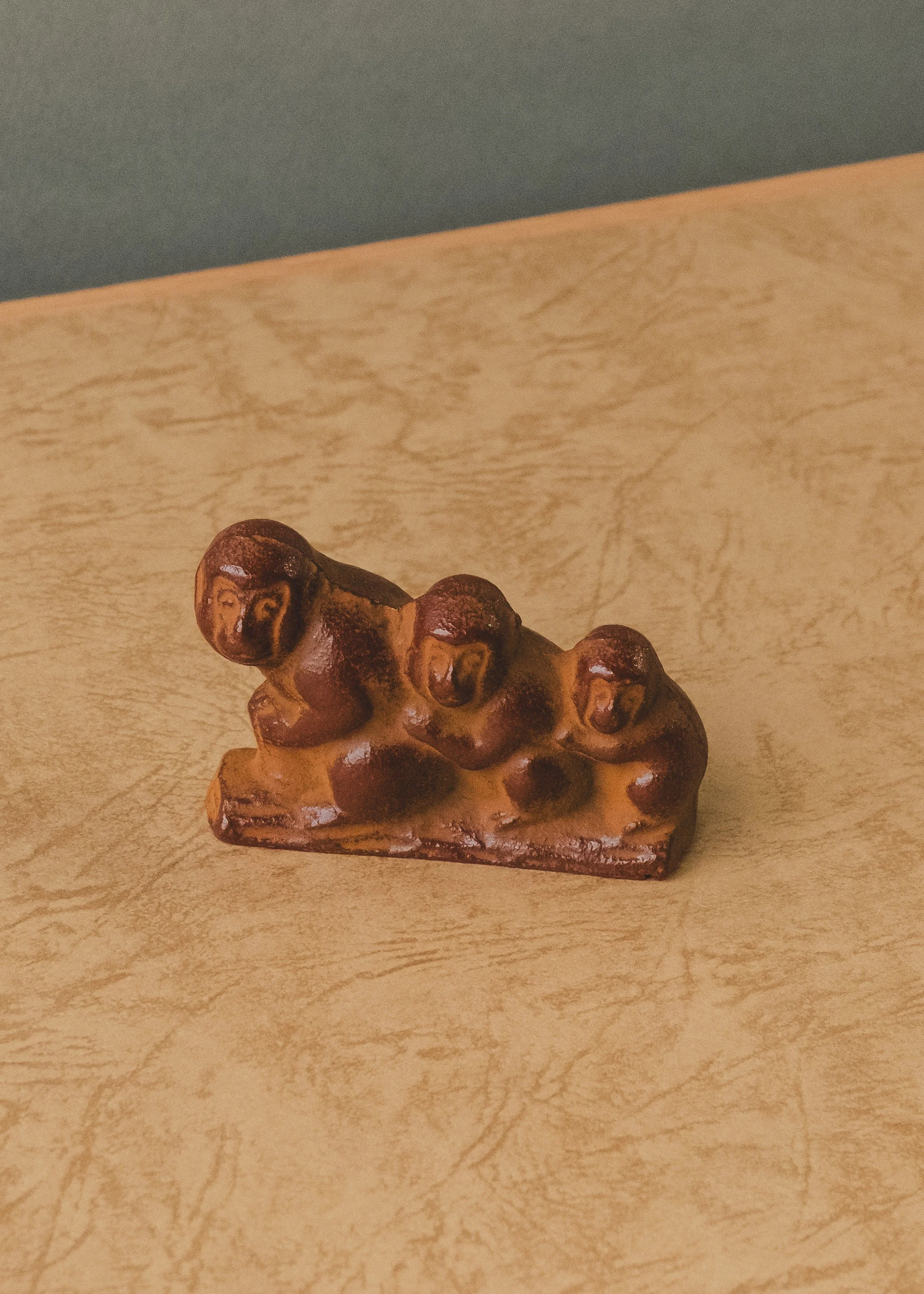 Nambu Tekki iron monkey sculpture. Vintage 1954 Japanese casting artifact depicting a family guardian. Multi-purpose paperweight and brush rest.