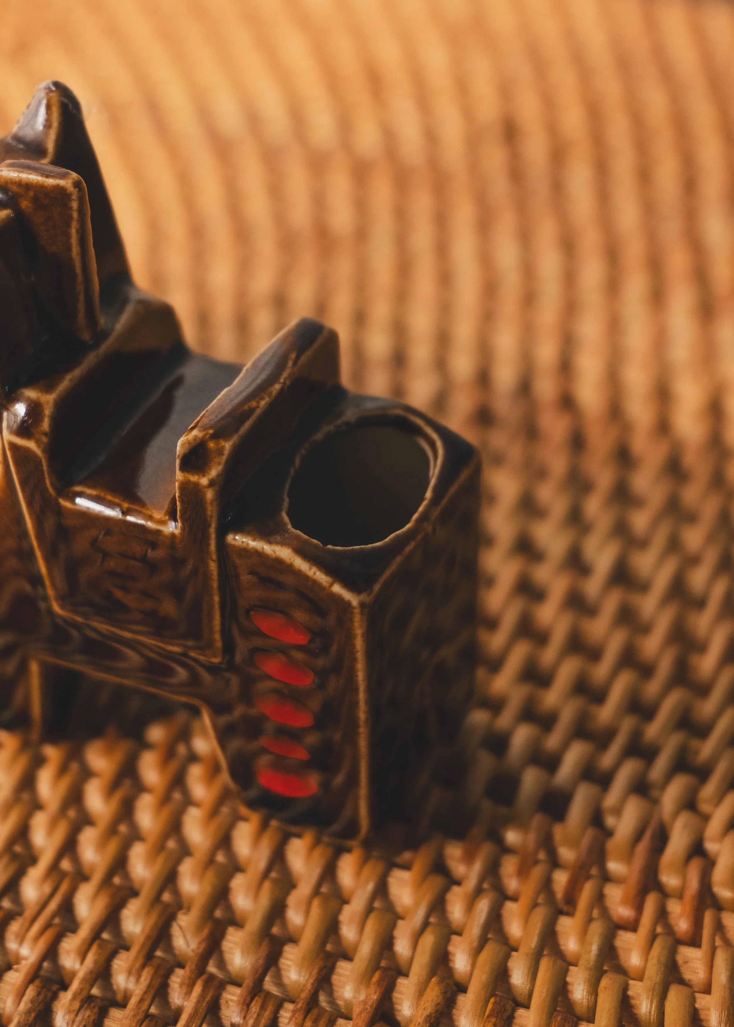 Hand-painted brown glazed ceramic horse sculpture functioning as a desk valet or toothpick stand.