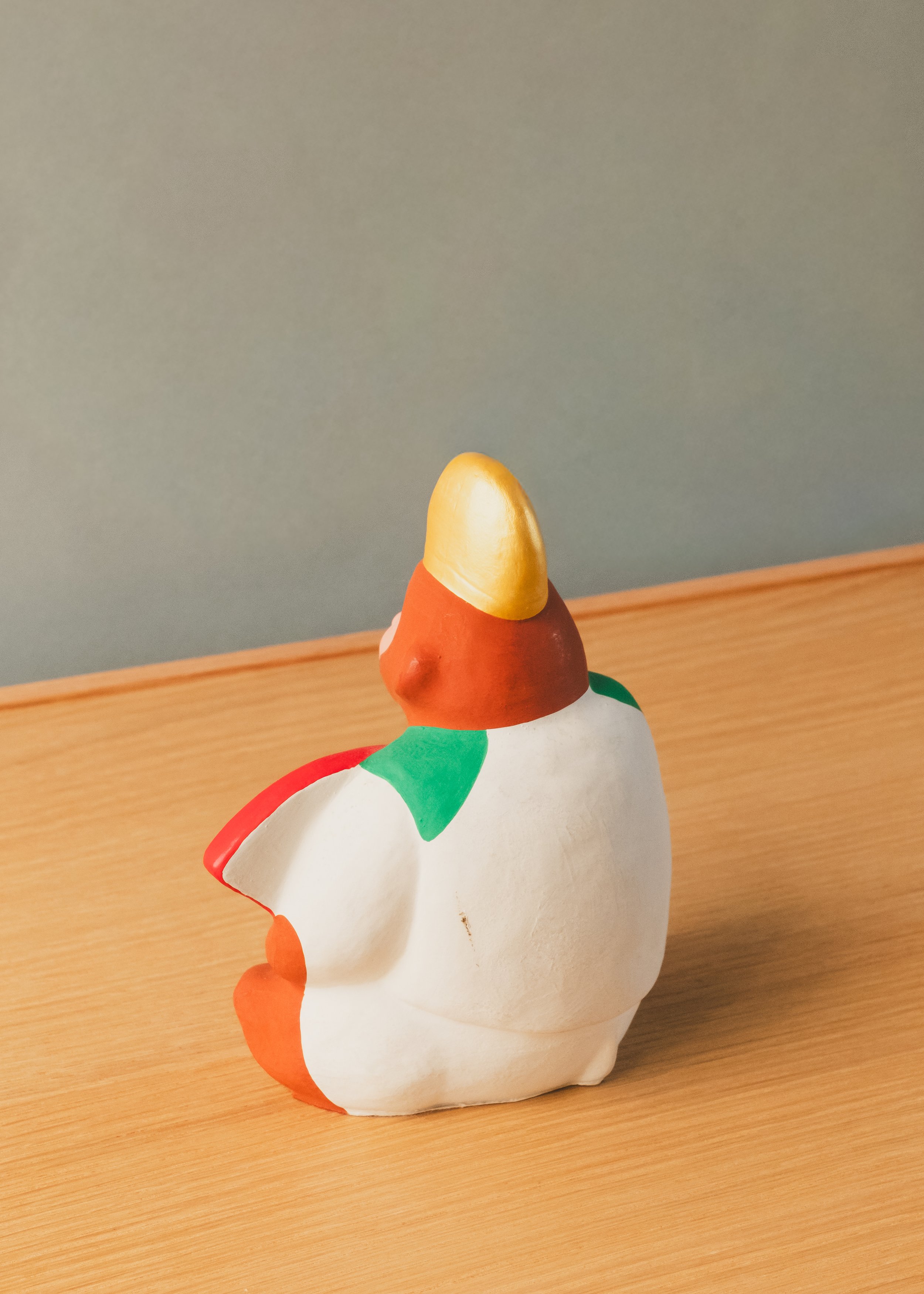 Rear view of an archival Hanamaki clay doll from 1974. Revealing the authentic rustic pigments and handcrafted texture of Northern Japanese tradition.