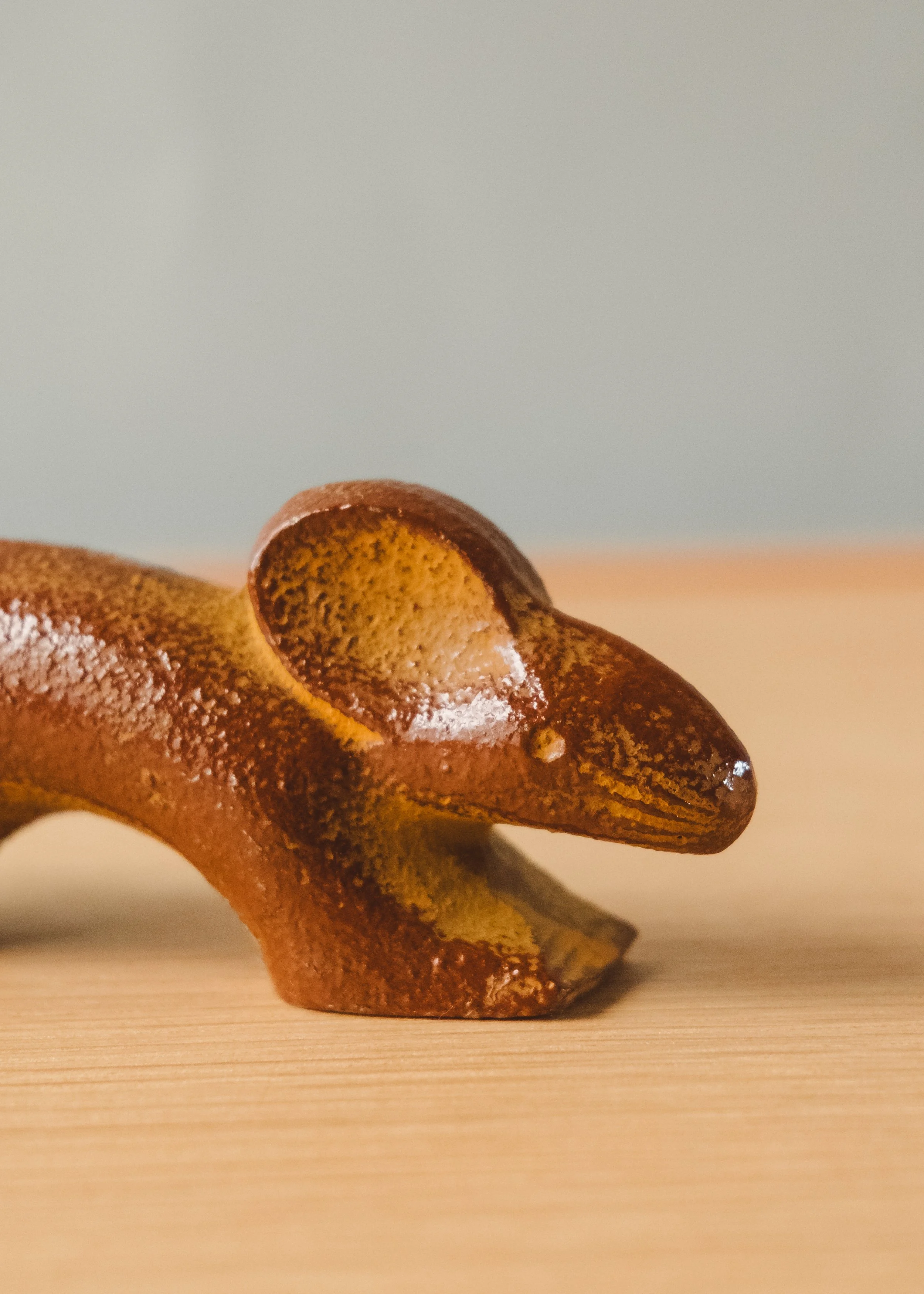 Detail of hand-finished iron texture (Ihada) on a Nambu rat sculpture's head. Showcasing traditional Japanese casting craftsmanship.