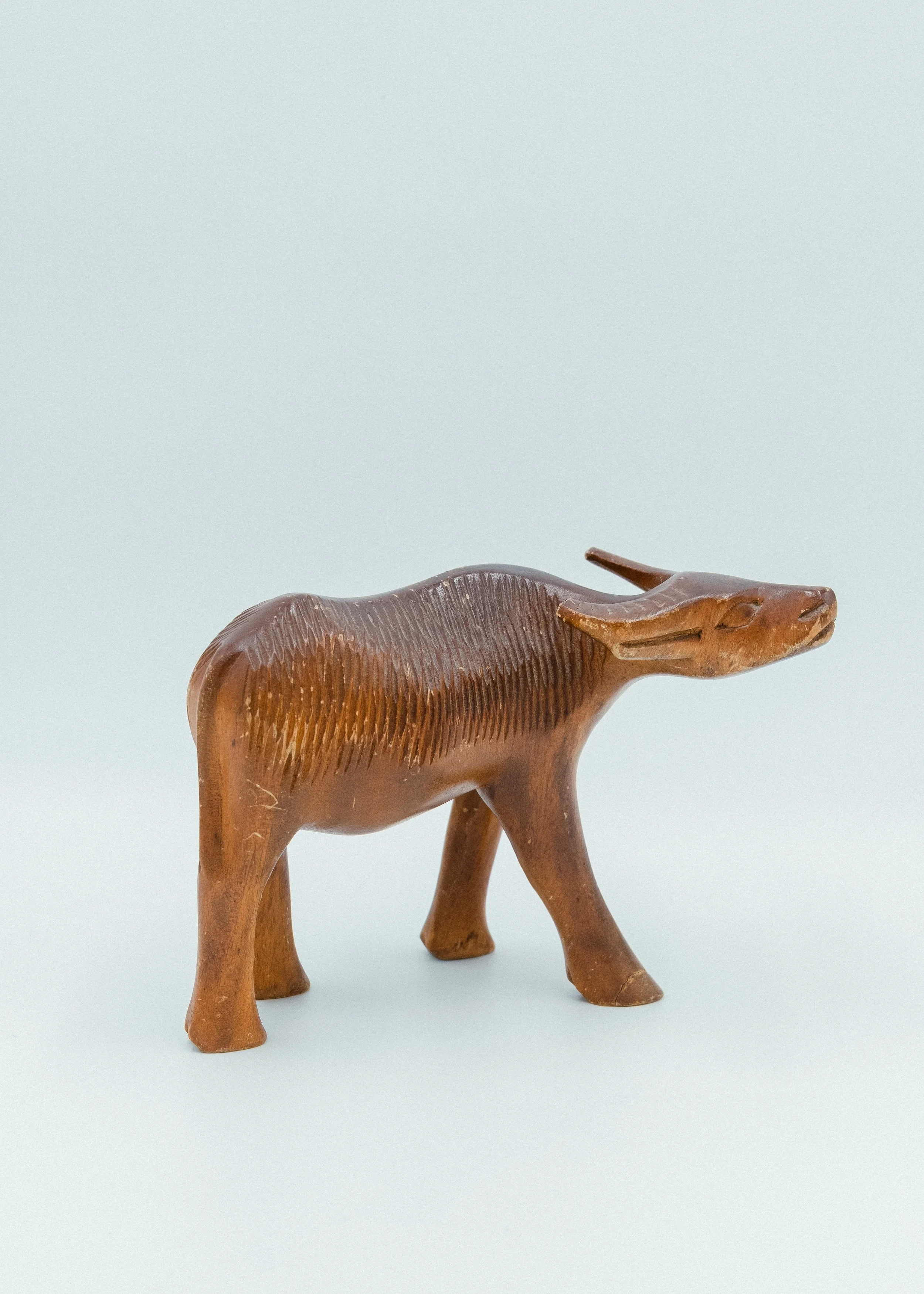 Vintage wooden water buffalo sculpture from Taketomi Okinawa Japandi style minimalist interior object