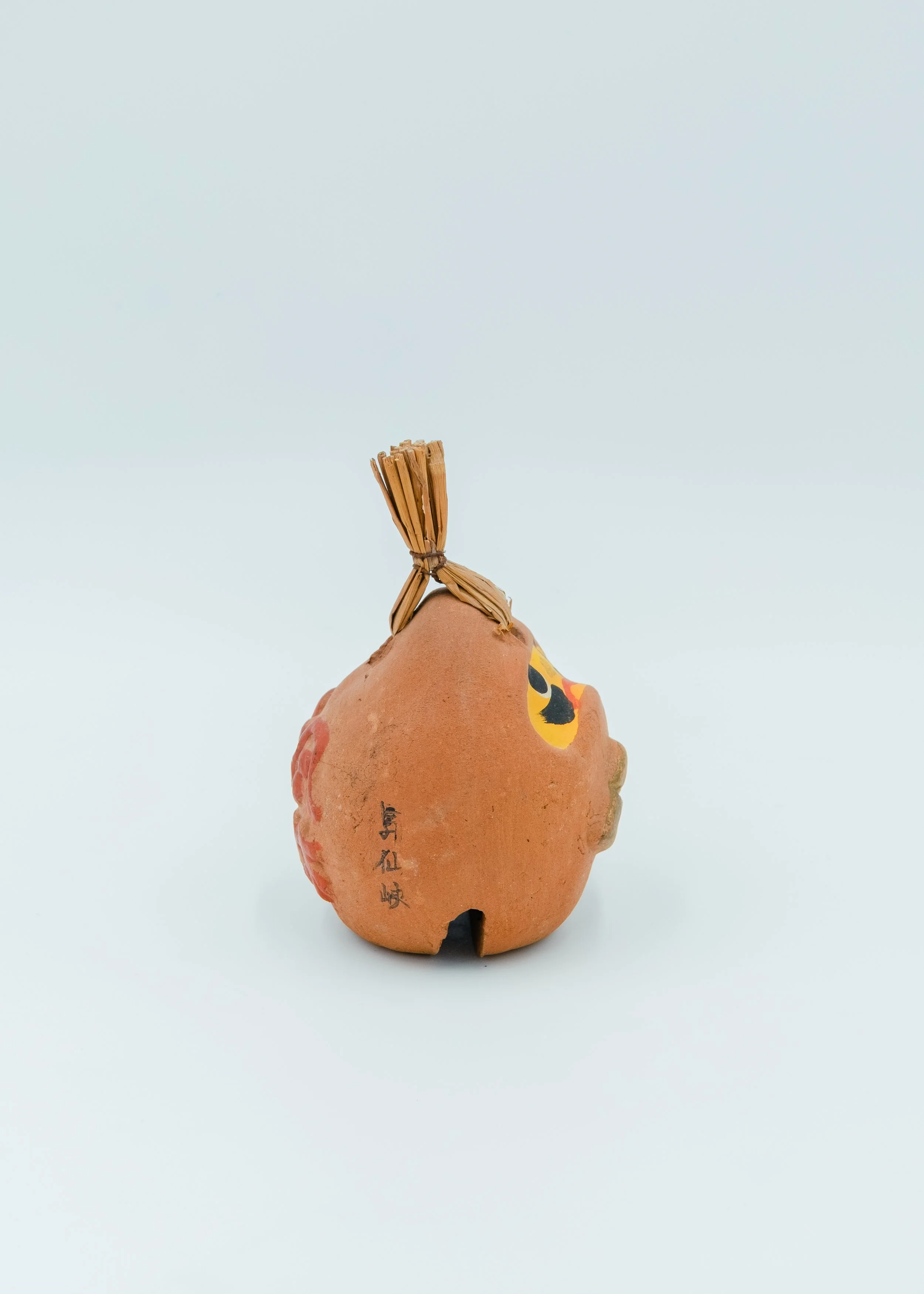 Close-up of the Shosenkyo spiritual site origin marking and hand-embossed kanji on the UNGLAZED TALISMAN 1970. Authentic provincial archival specimen.