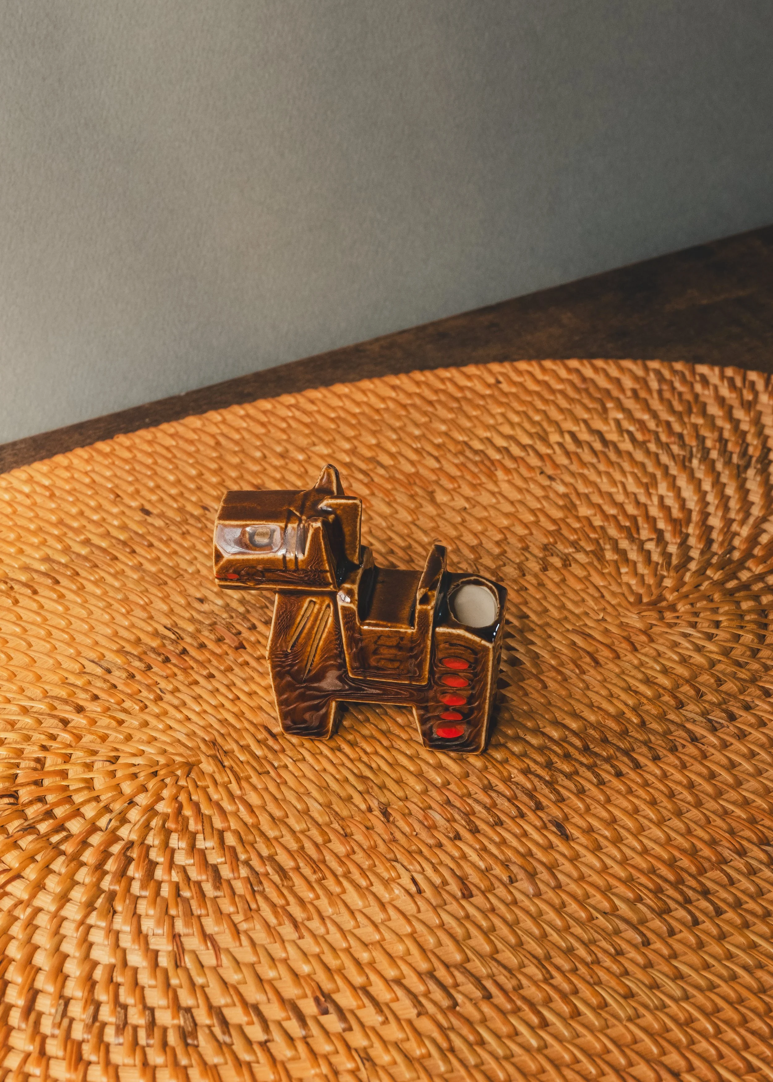 Vintage Japanese ceramic horse figurine with faceted polygon shape and amber glaze, 1960s Shōwa period.