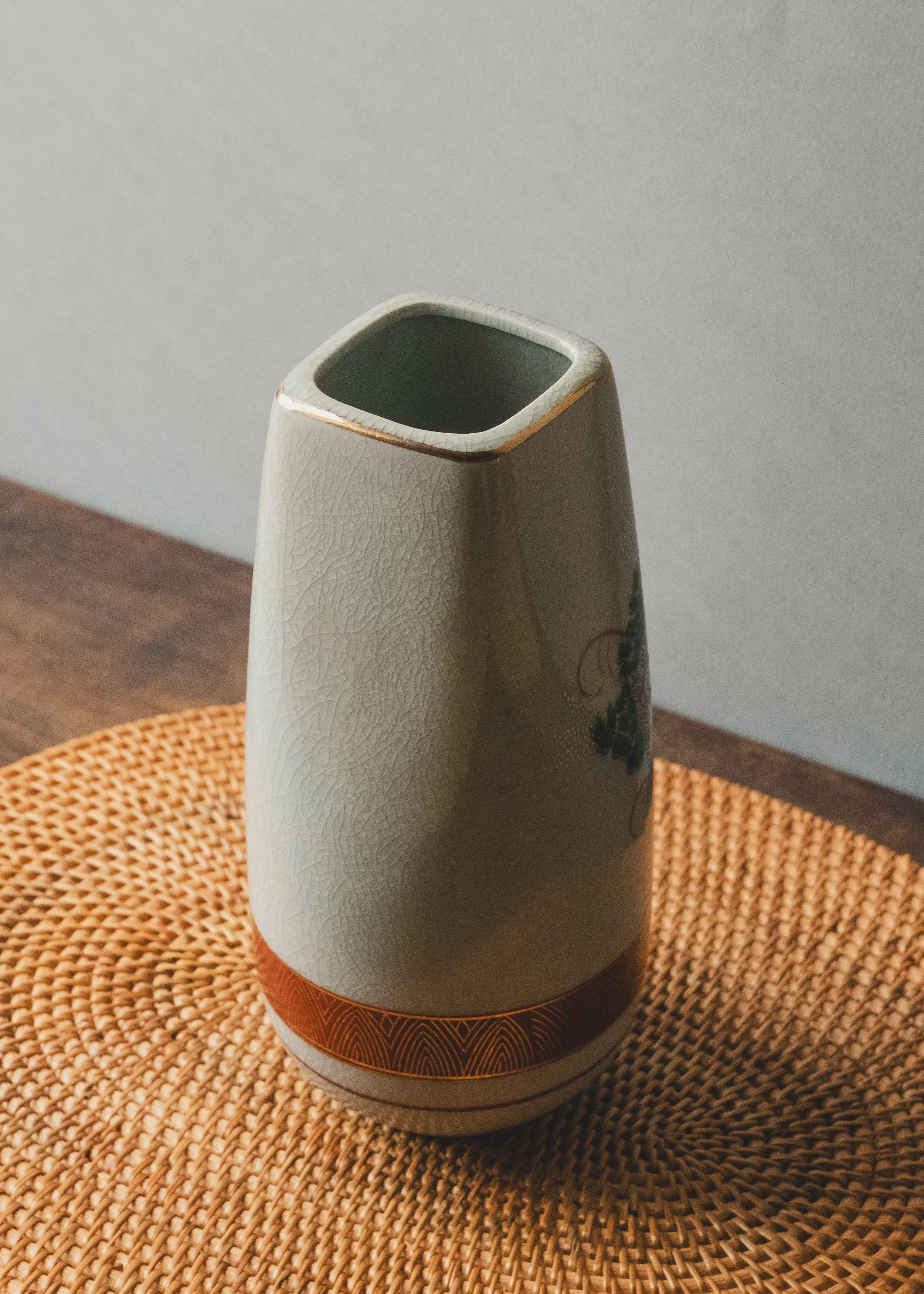Exquisite vintage Japanese Kinrande ceramic flower vase with hand-painted gold waka poetry script and colorful floral patterns on white crackle glaze surface.