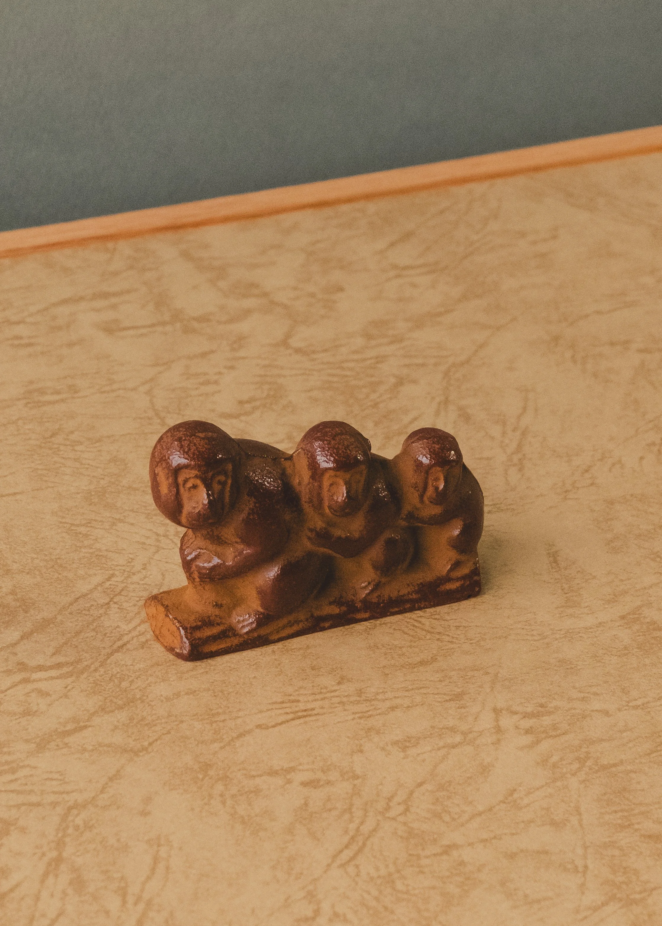 Nambu Tekki iron monkey sculpture. Vintage 1954 Japanese casting artifact depicting a family guardian. Multi-purpose paperweight and brush rest.