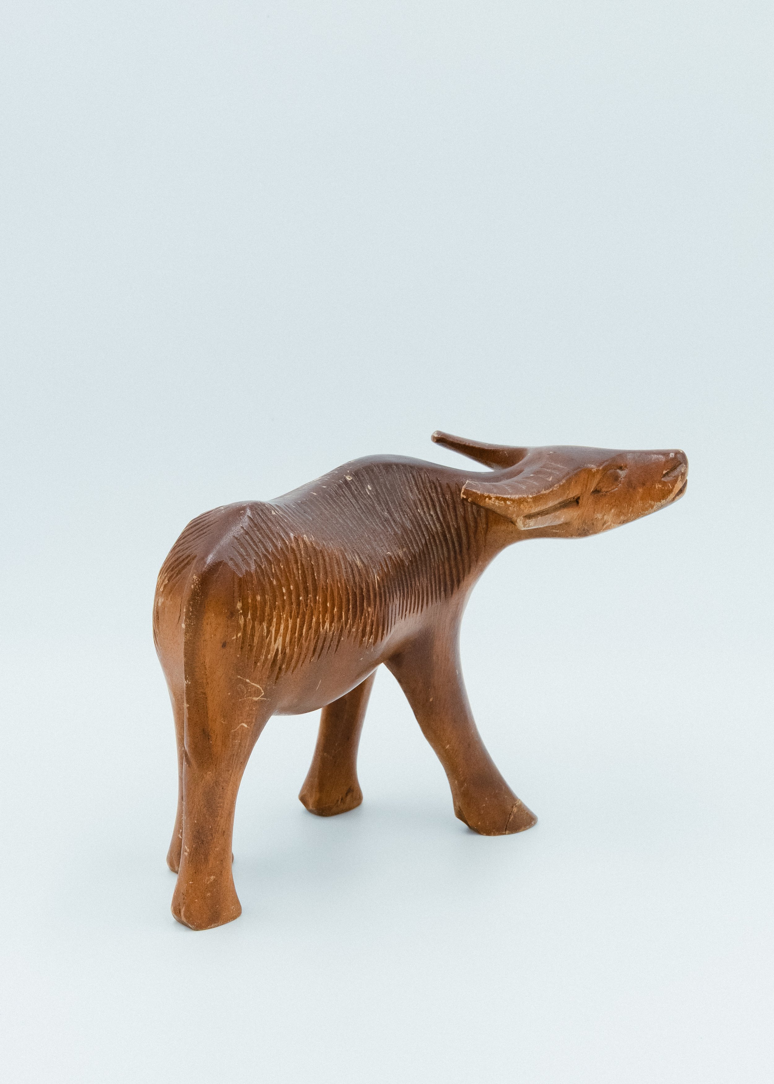Vintage wooden water buffalo sculpture from Taketomi Okinawa Japandi style minimalist interior object