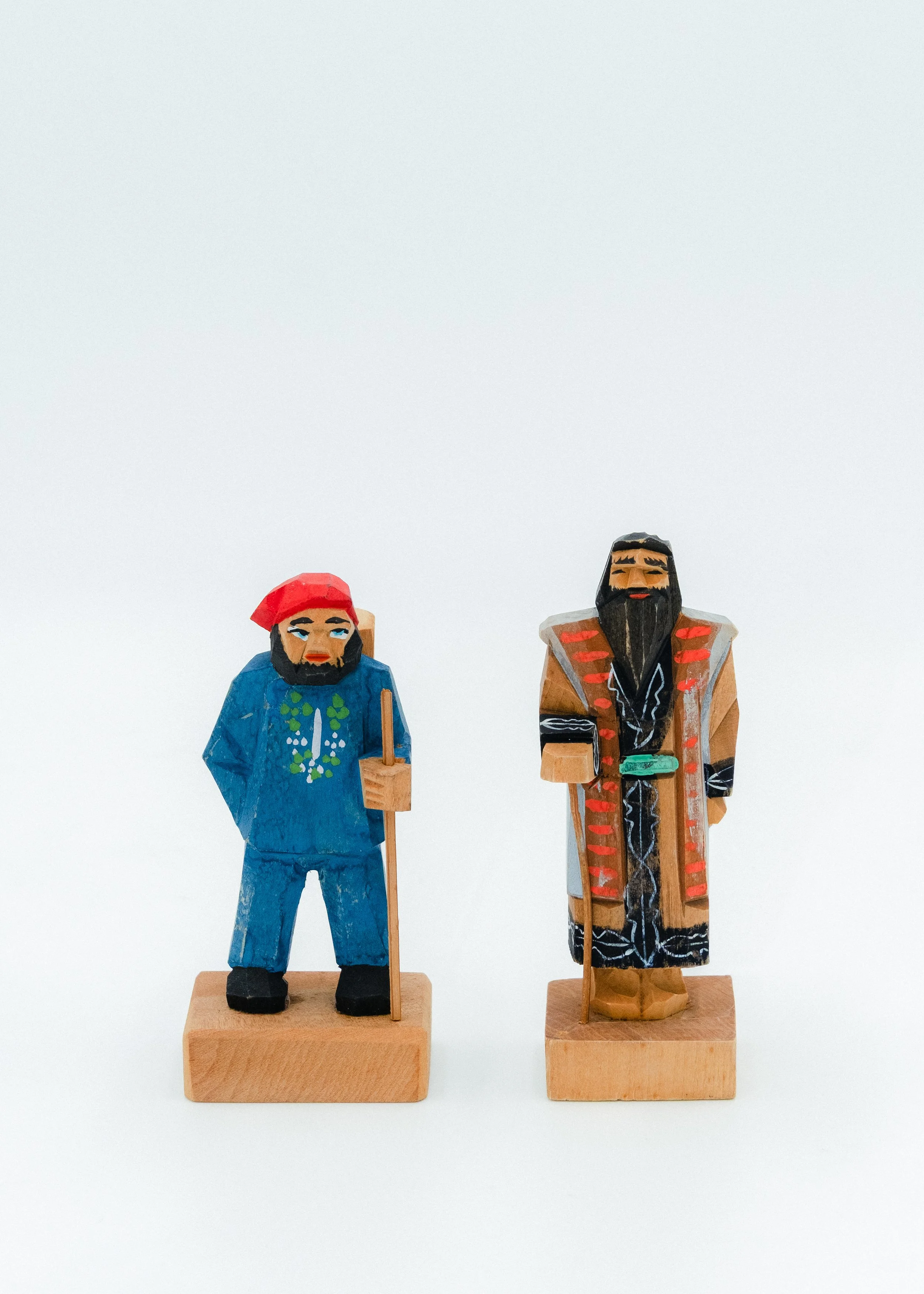 Set of two antique Ainu wood carvings bearded elder and traveler figurine Japanese indigenous mingei decor