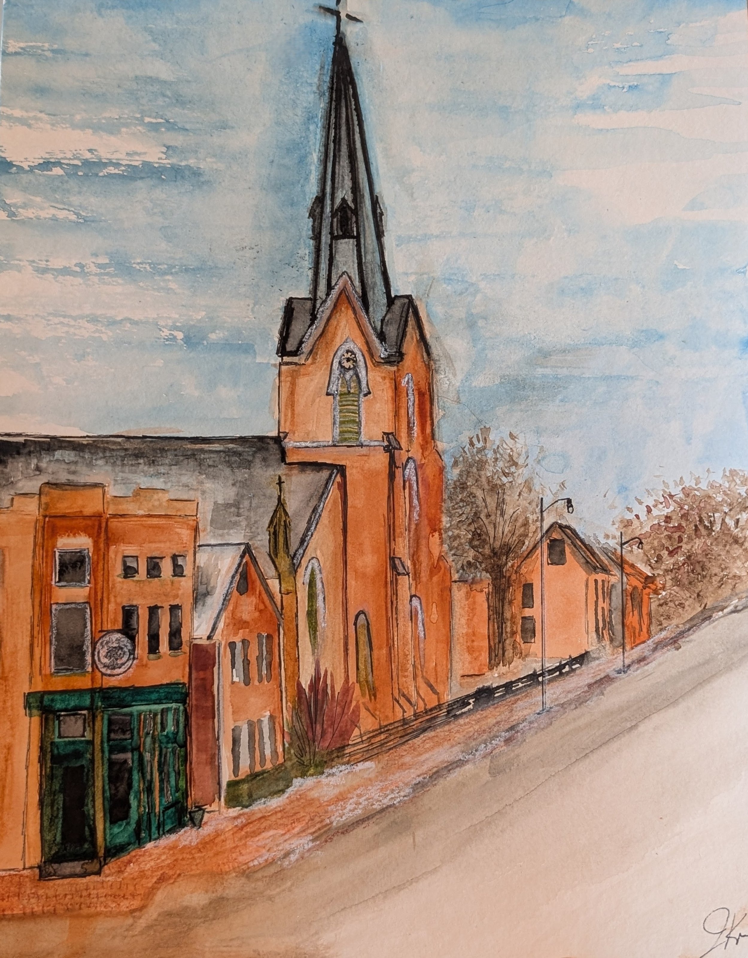 A watercolor painting of a large church with a tall steeple, orange brick walls, a clock on the front, and a green door at the main entrance. There are smaller buildings, leafless trees, and streetlights in the surroundings against a partly cloudy sky.