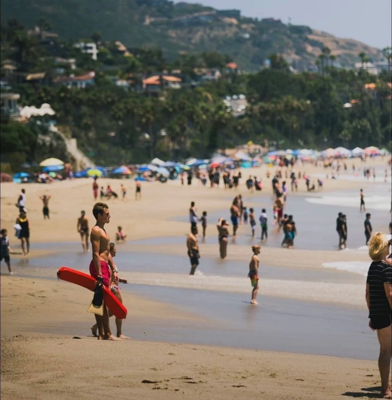 Gavin Murray lifeguarding at Laguna Beach — the discipline behind Frontline Fence in Salt Lake and Utah County