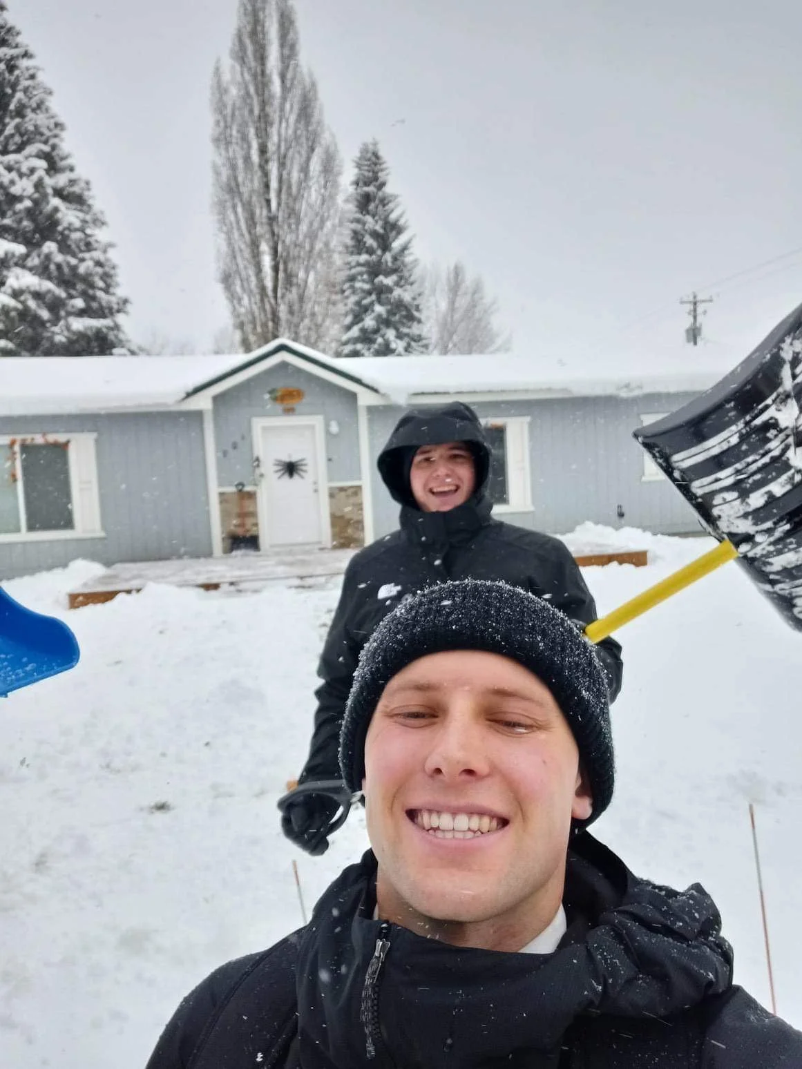 Frontline Fence founder Gavin Murray serving in the snow during his mission — the work ethic behind our Utah fence company