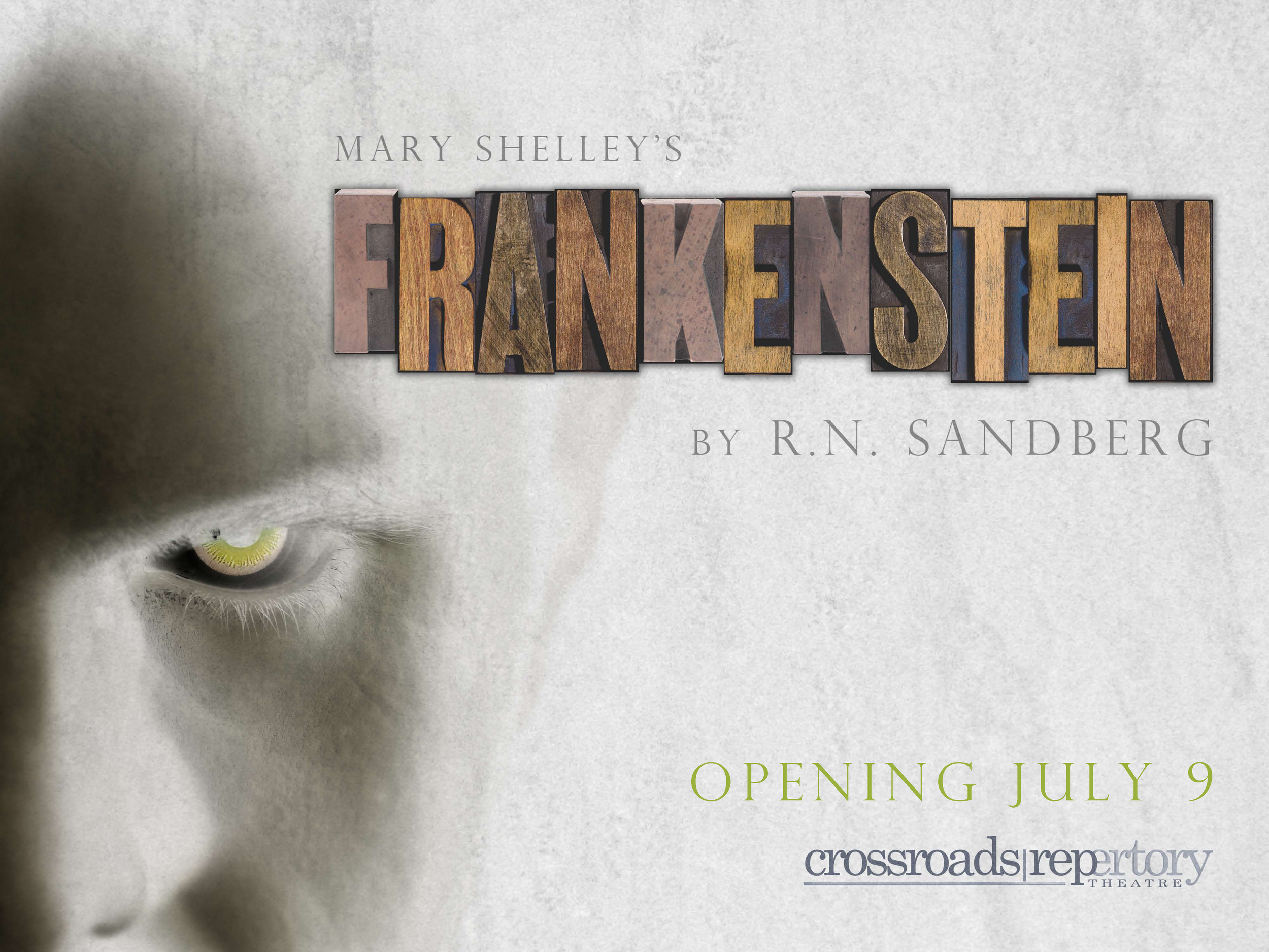 Promotional poster for Mary Shelley's 'Frankenstein' by R.N. Sandberg, opening July 9 at Crossroads Repertory Theatre, featuring a close-up of a person's face with pale skin and yellowish eye.