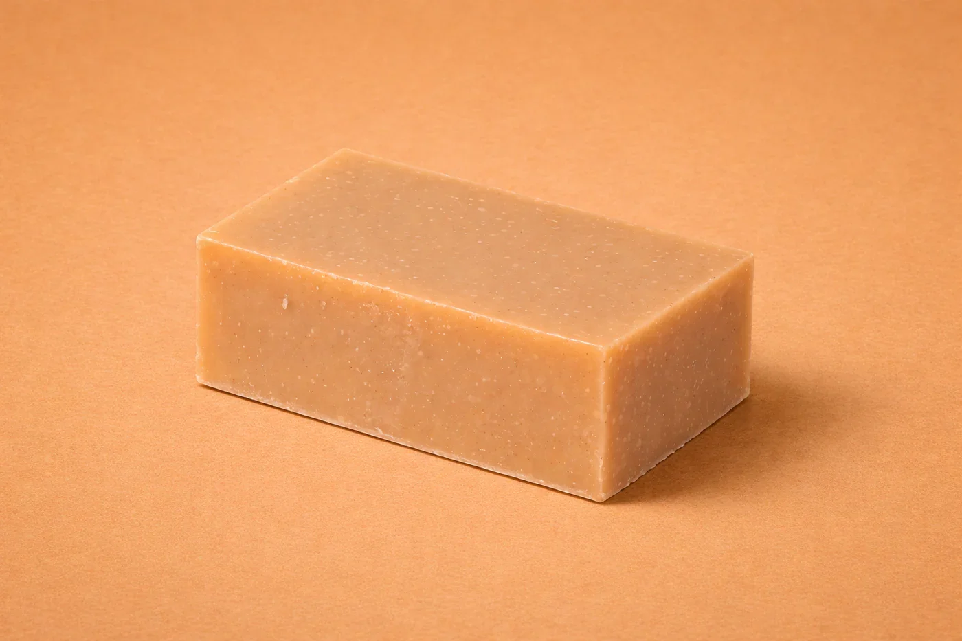 Softly_lit_soap_on_beige_background.webp