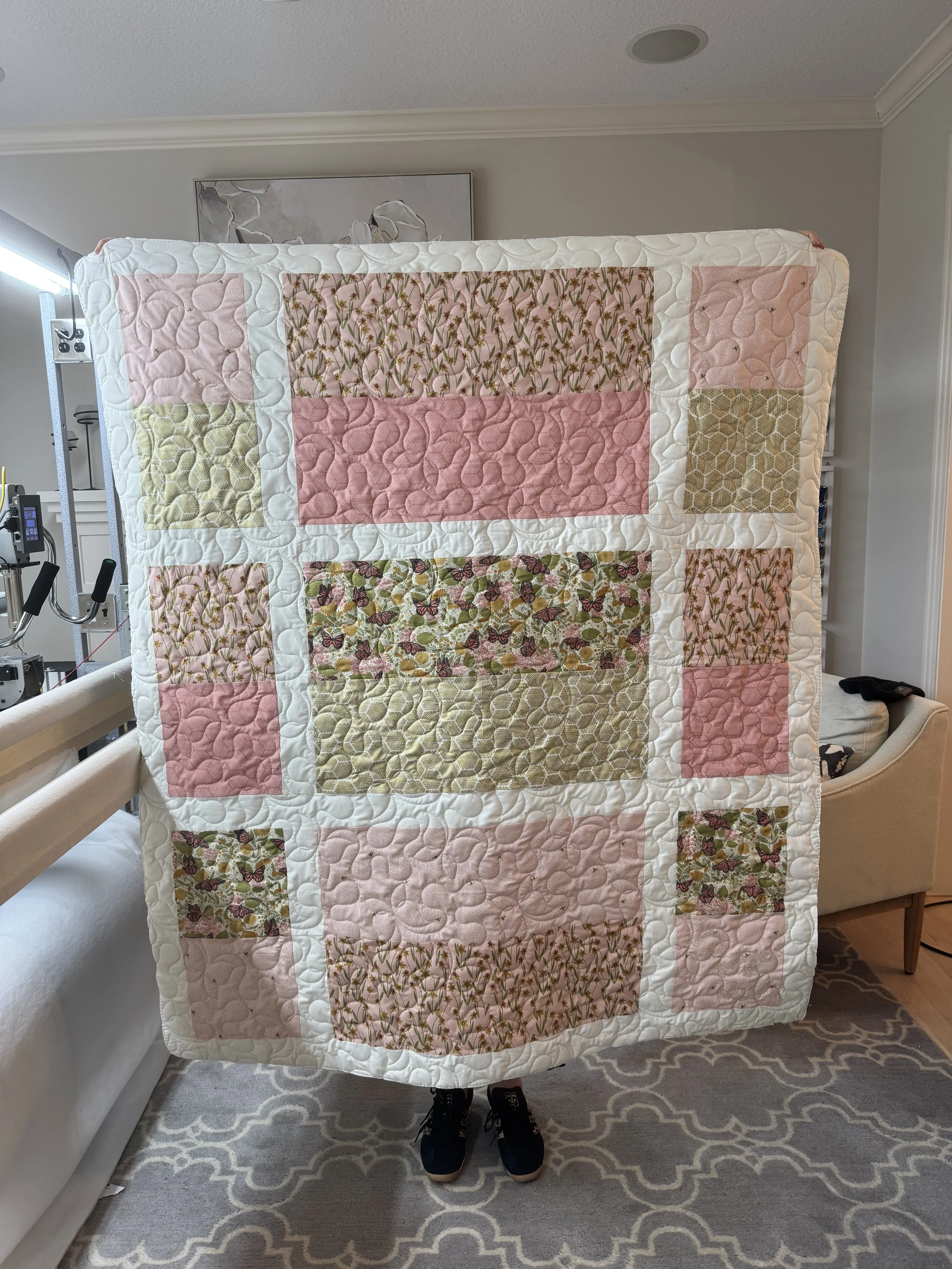 Hashtag Quilt from April.  Soft and Bright Batting really makes the quilting pop