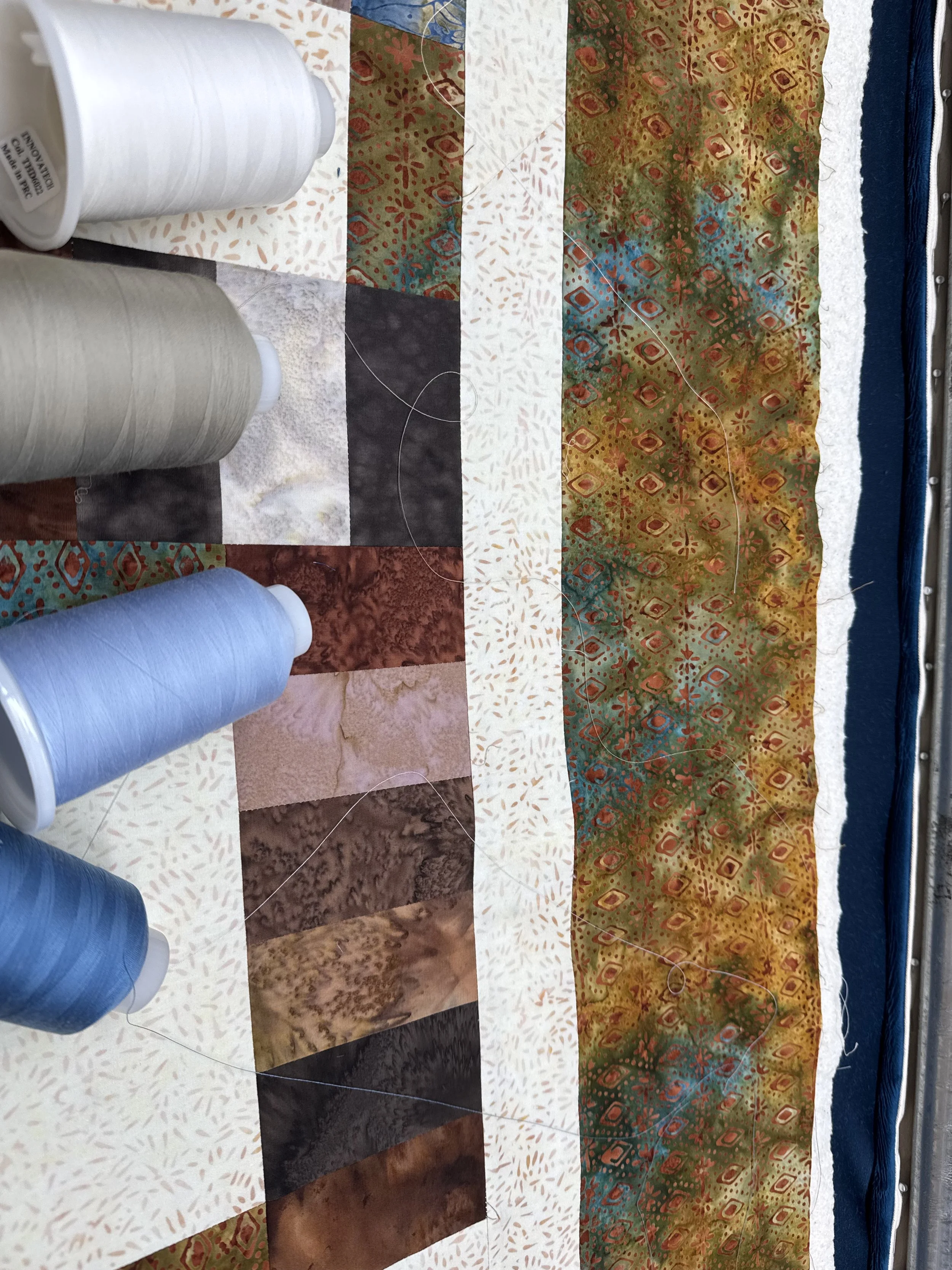 Thread Auditions on Jonee's Batik Quilt