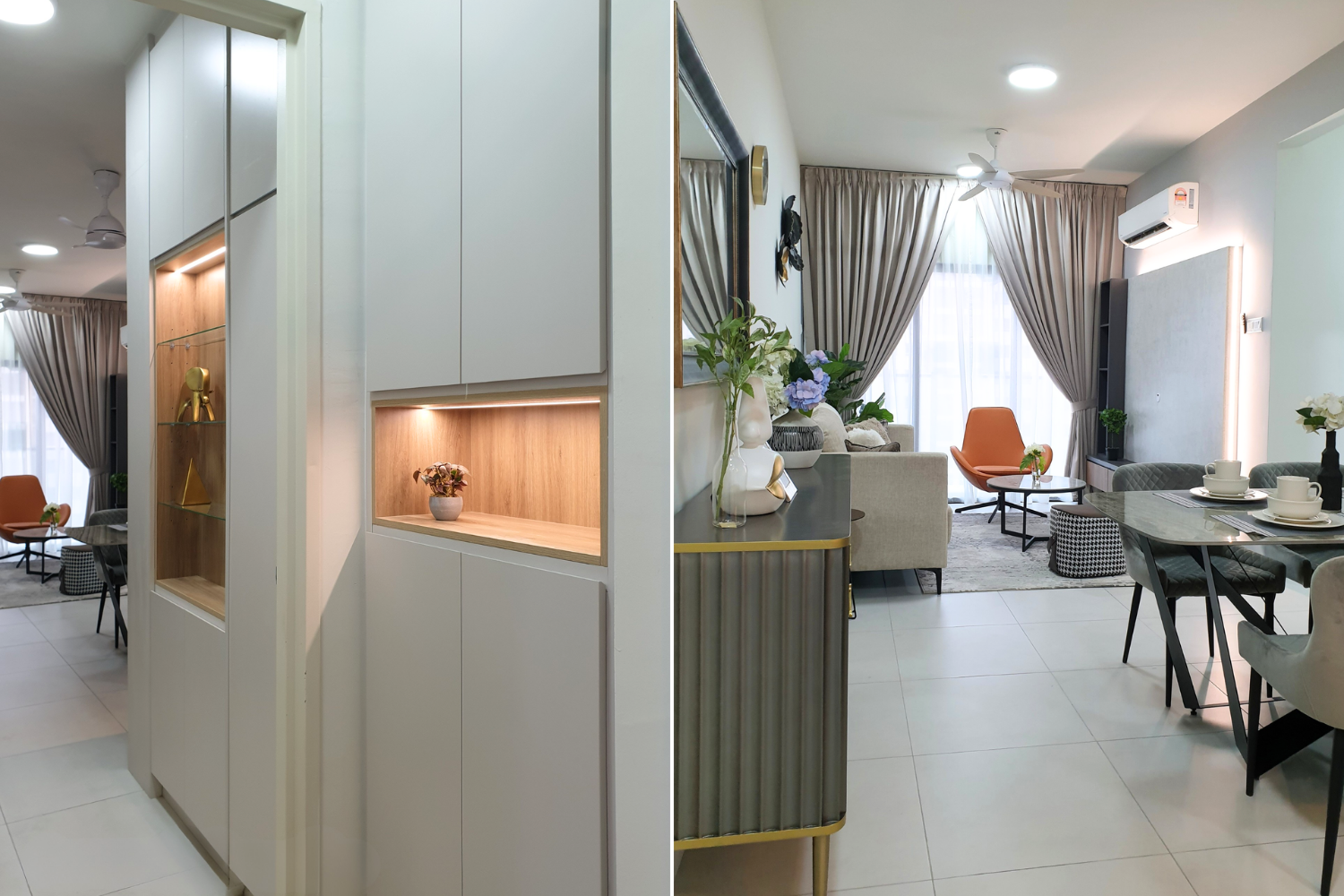 A modern living room with beige curtains, a ceiling fan, and a wall-mounted air conditioner. The space includes a round dining table with place settings, a gray sofa, an orange chair, and decorative plants and vases. The room is well-lit with natural