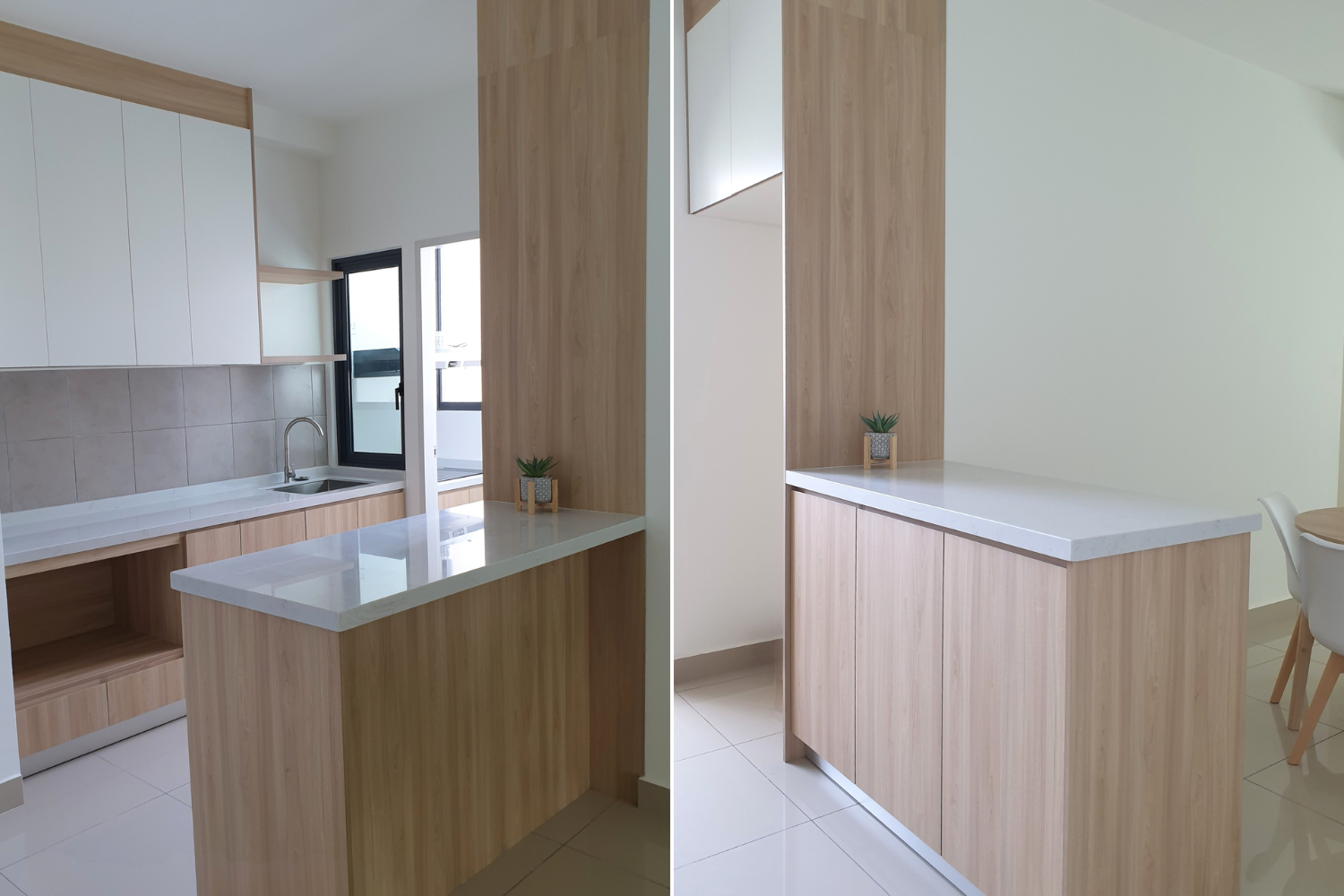 Modern kitchen with white cabinets, beige backsplash, wooden accents, and a small potted plant on the counter.