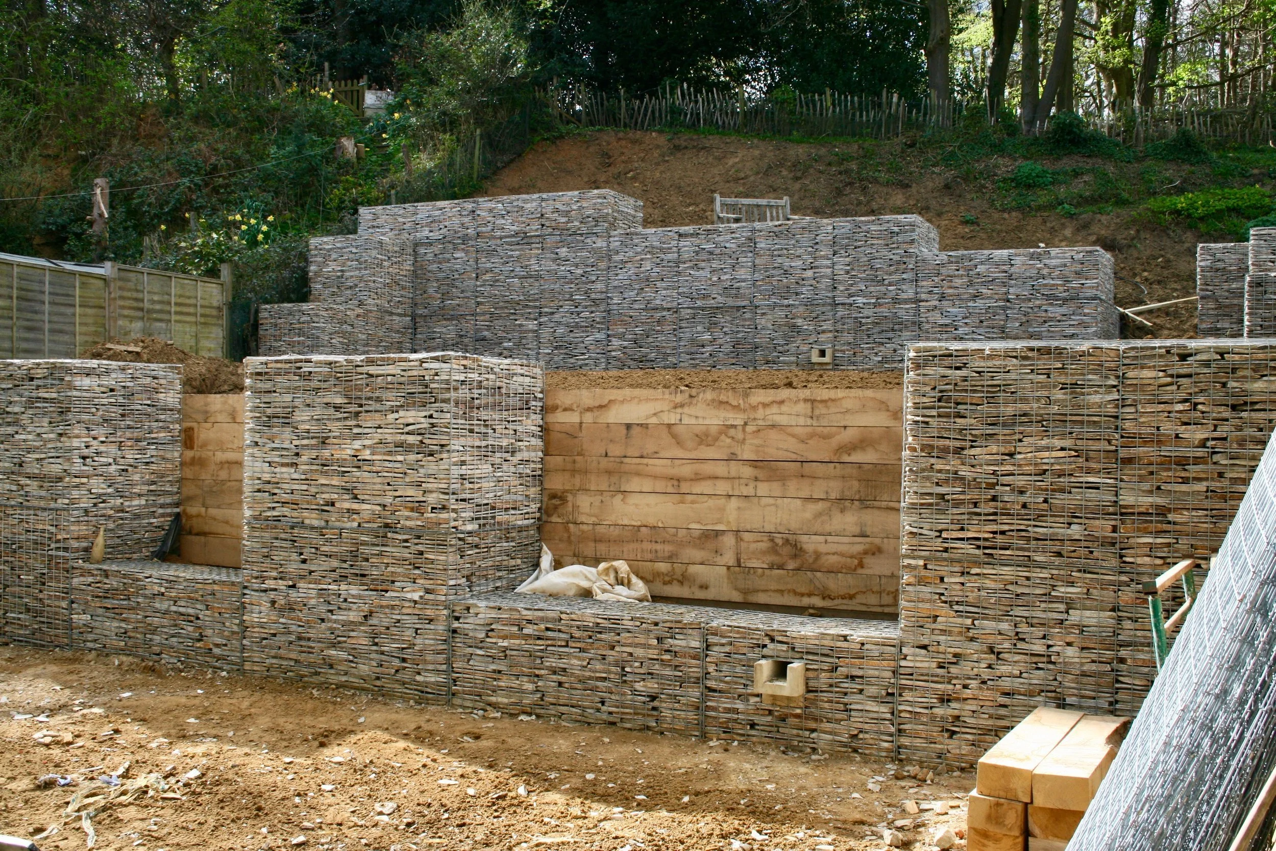 Gabion wall construction on steep sandpit site