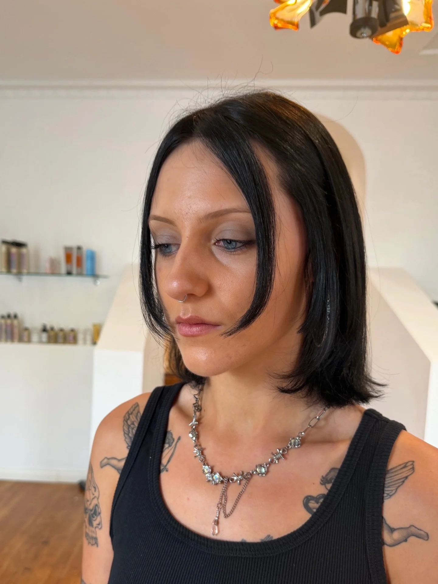 Blonde ➝ black transformation for Courtney 🖤

Going dark isn&rsquo;t as simple as just putting black dye over blonde. The key step is filling the hair first &mdash; replacing the warmth that was lifted out during bleaching. This helps the colour sta