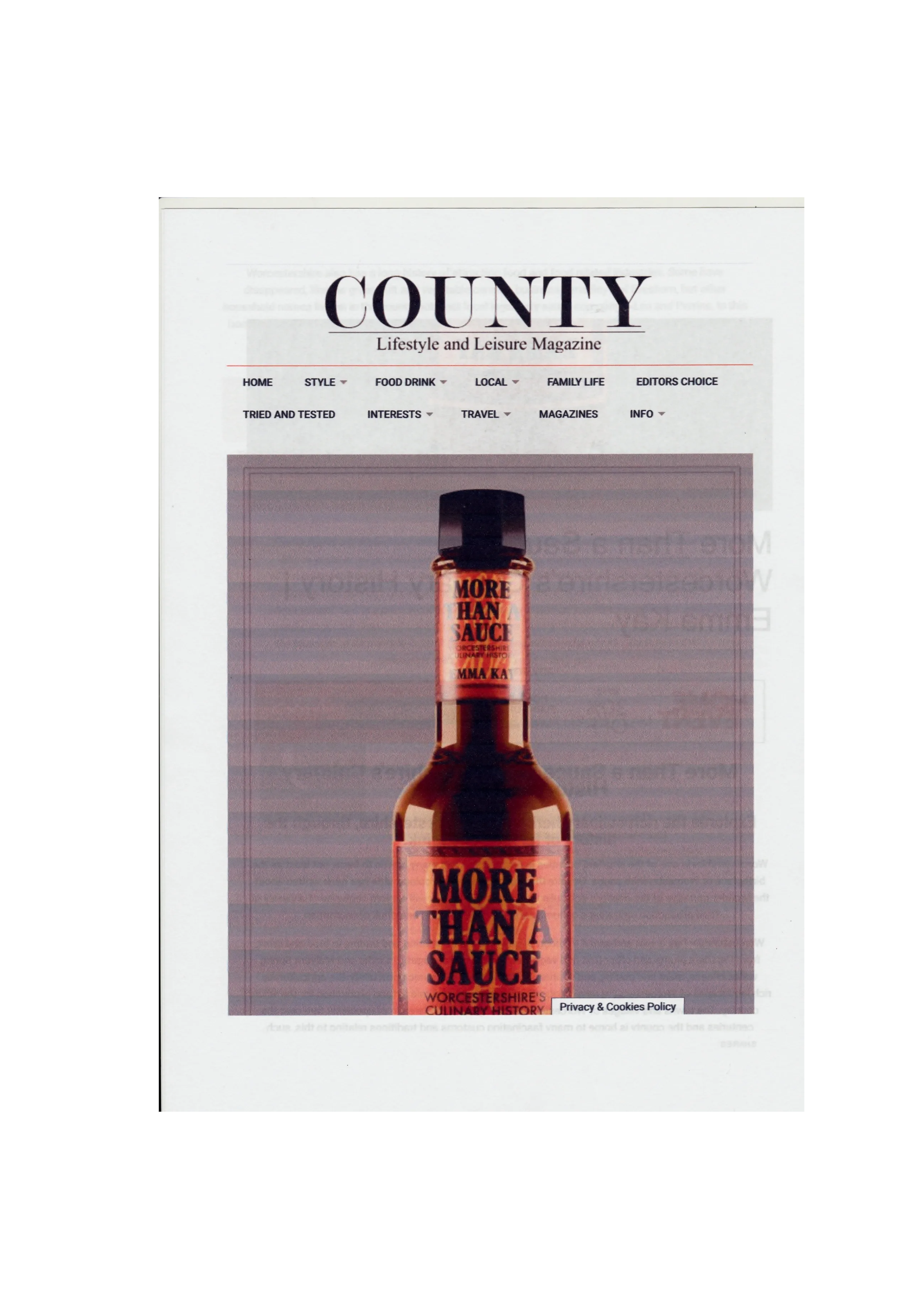 Magazine cover titled "COUNTY Lifestyle and Leisure Magazine" featuring a photo of a hot sauce bottle labeled "More Than A Sauce" with additional text "Worcestershire's Culinary History". Article about Historian Emma Kay and her book about Worcester.