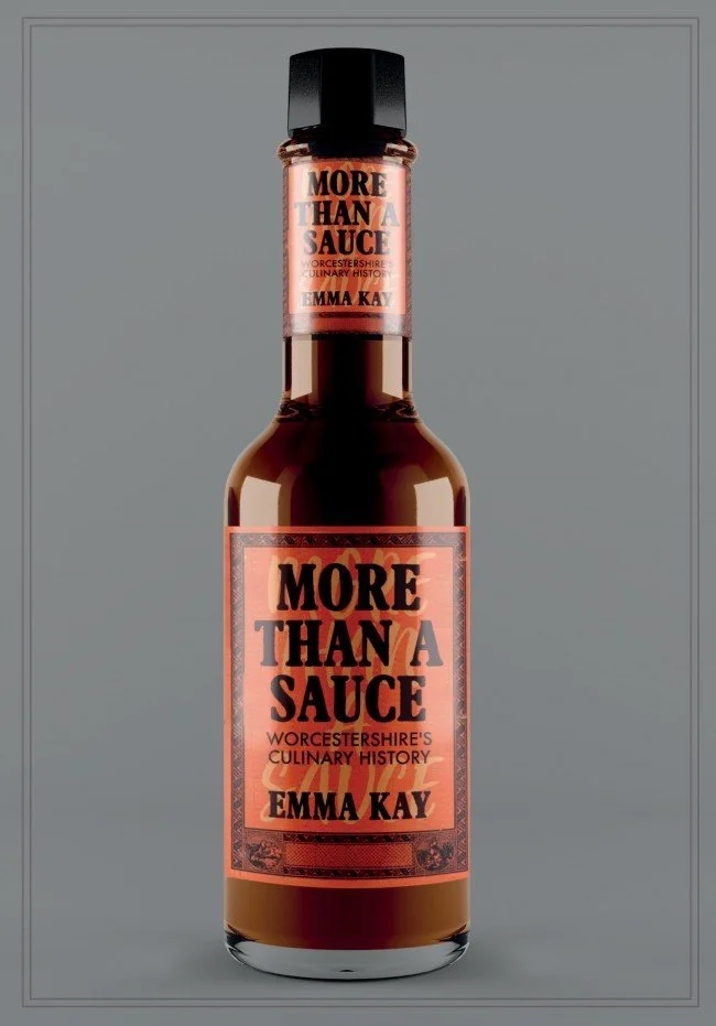 A bottle of hot sauce labeled "More Than a Sauce" with the subtitle "Worcestershire's Culinary History" by Emma Kay, positioned vertically against a plain gray background.