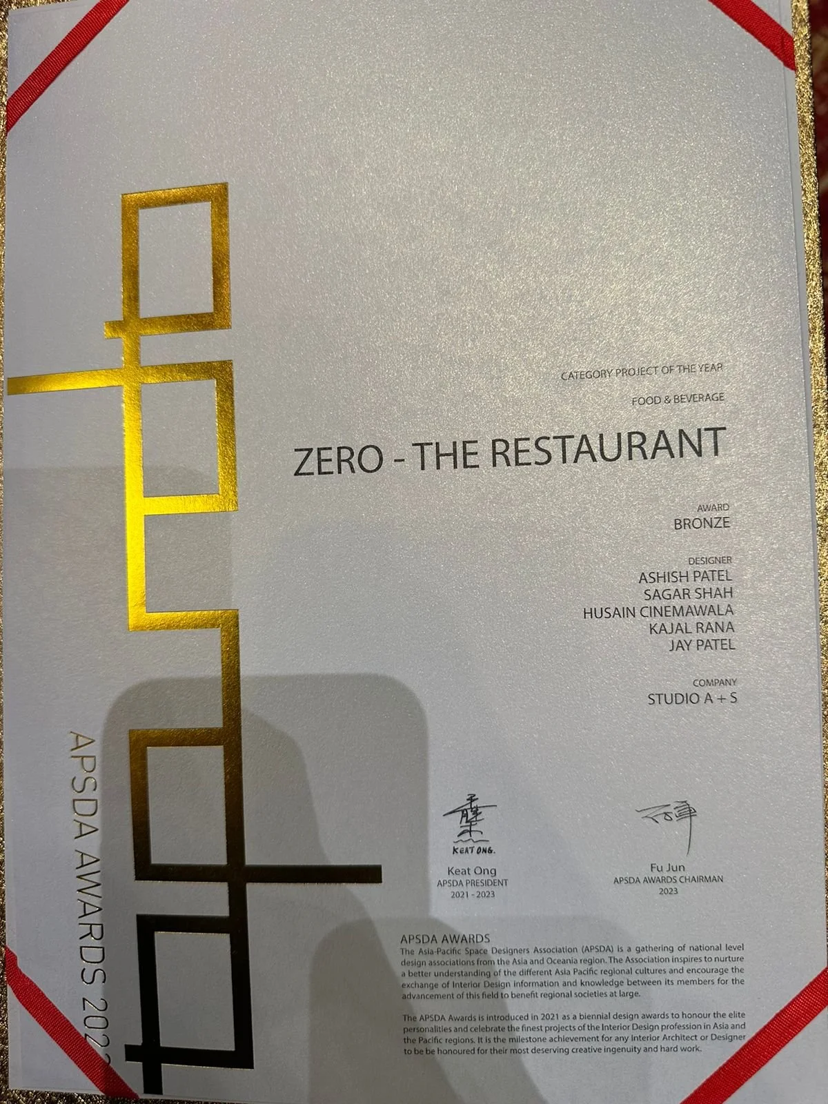Certificate of award from APSDA for the restaurant 'Zero - The Restaurant,' receiving the bronze category project of the year in food and beverage, designed by Ashish Patel, Sagar Shah, Husain Cinemawala, Kajal Rana, and Jay Patel, presented by Keat 