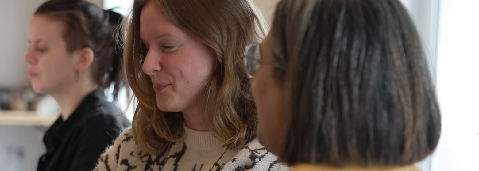 Close up of Opus team members chatting