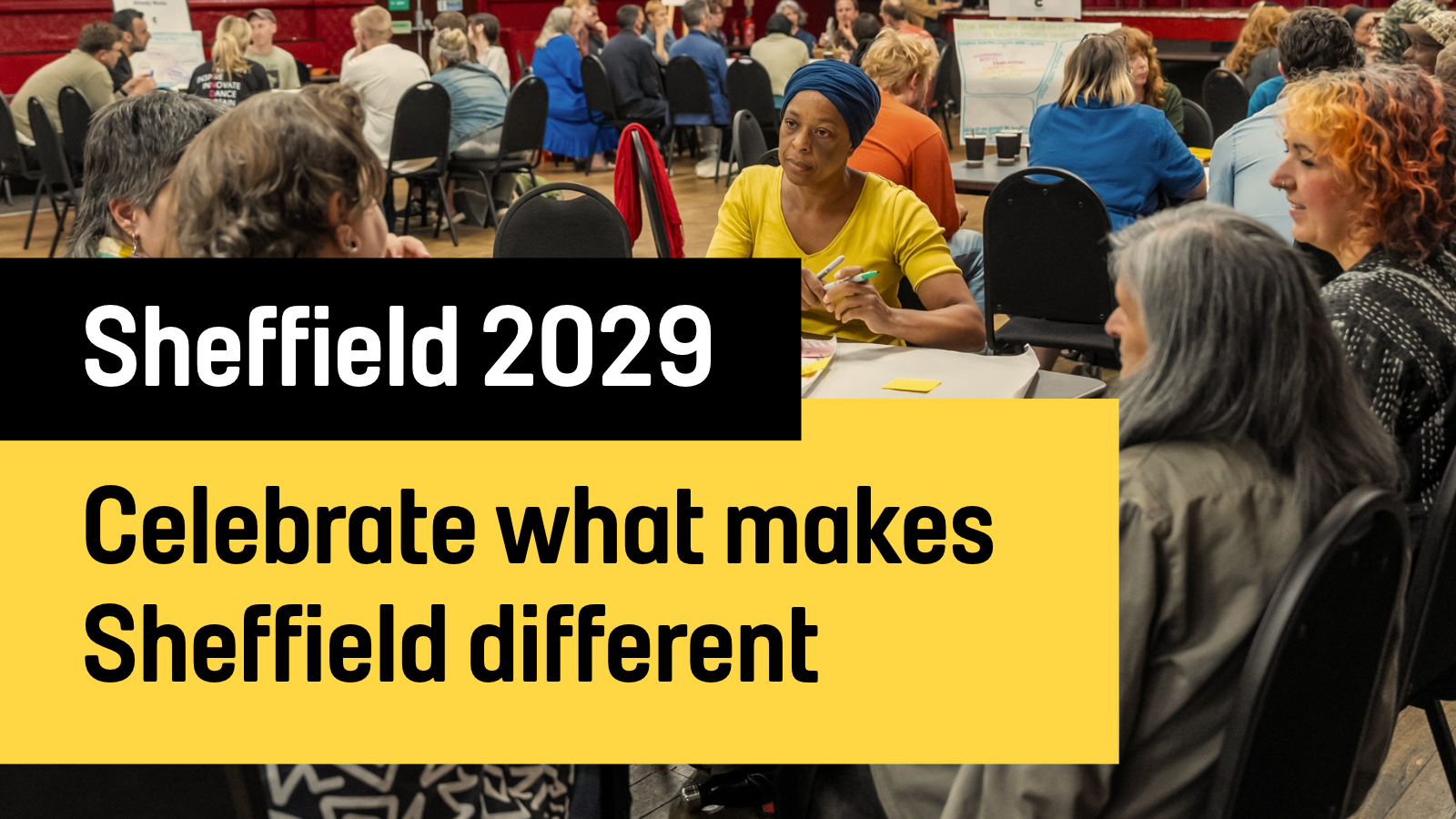 A graphic showing a photo of a group of people discussing something at a roundtable. Overlaid on this are the words "Sheffield 2029. Celebrate what makes Sheffield different"
