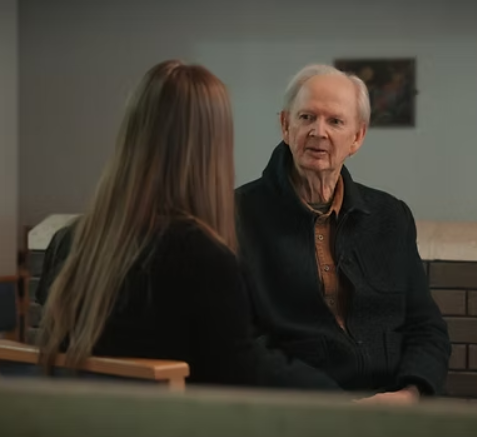 Still of people in conversation