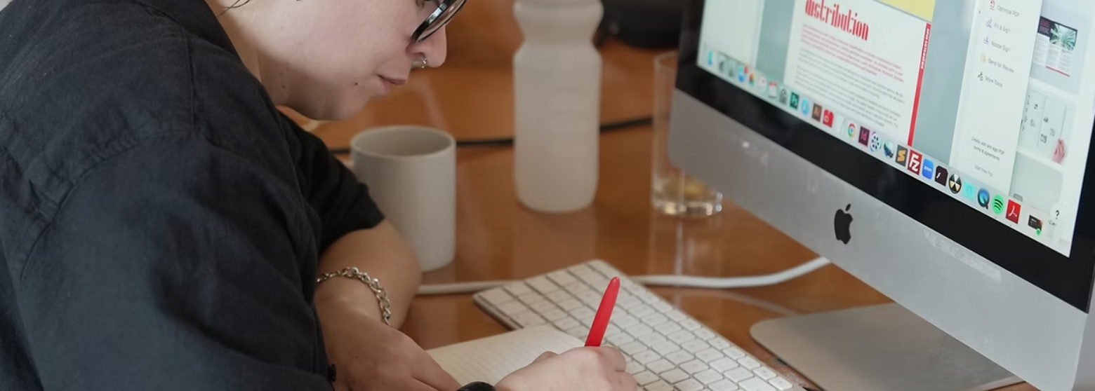 Opus team member working at a computer