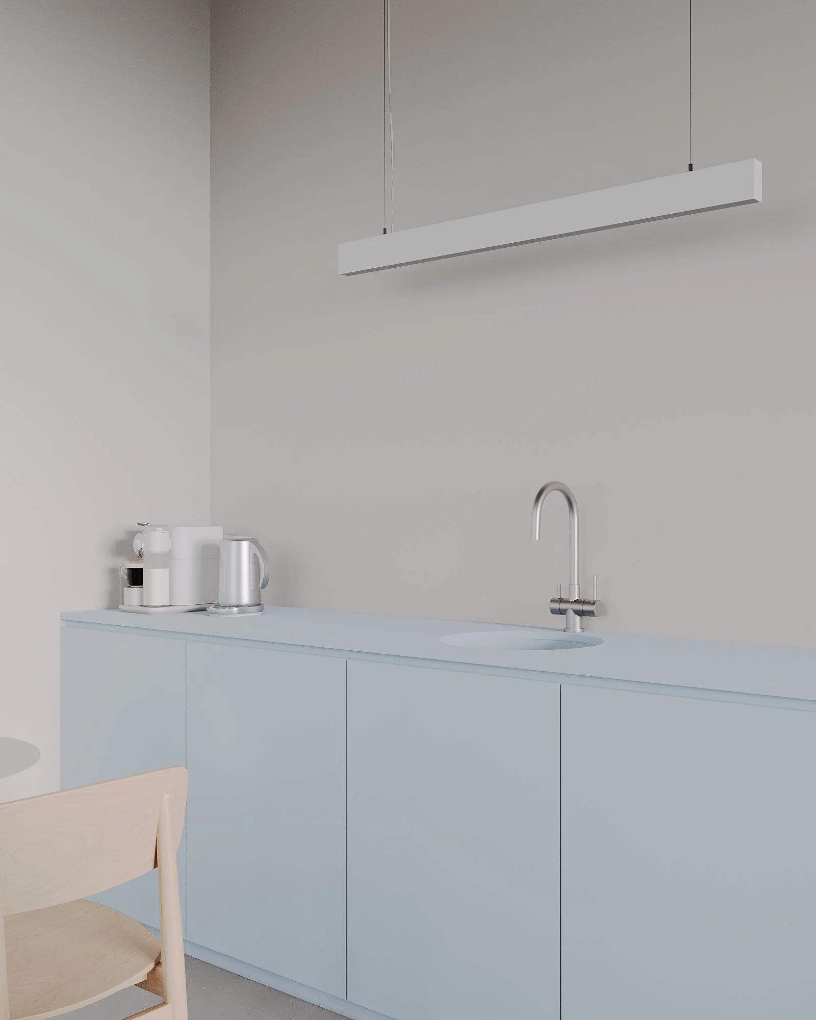 Minimalist kitchen with white cabinets, a sink with a modern faucet, a countertop with a kettle and containers, and a suspended rectangular light fixture.