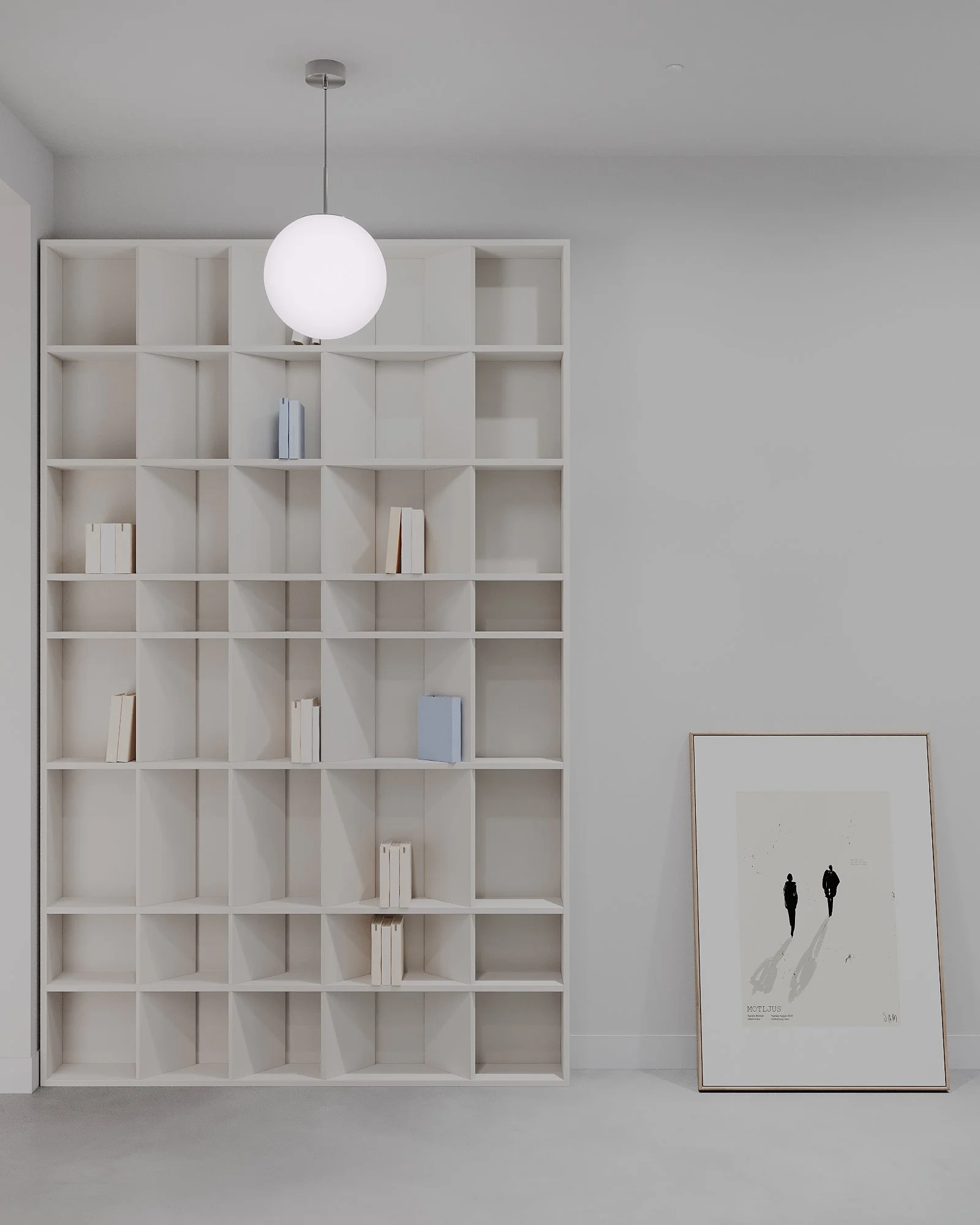 A white bookshelf with empty and partially filled sections, a hanging spherical white lamp, and a framed black-and-white artwork propped against the wall.