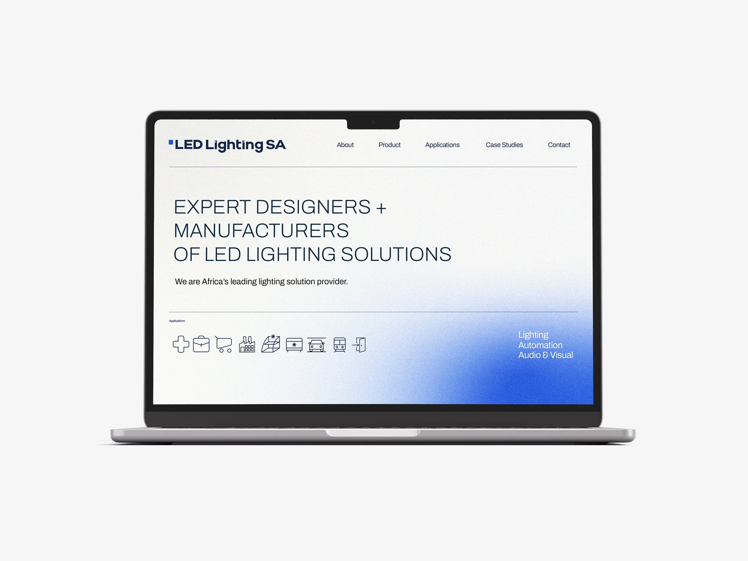 Laptop displaying a website for LED Lighting SA with a white background, blue gradient section, and menu options including About, Product, Applications, Case Studies, Contact. Main text states "Expert designers + manufacturers of LED lighting solutions," with icons representing various applications like healthcare, shopping, industrial, and automotive.