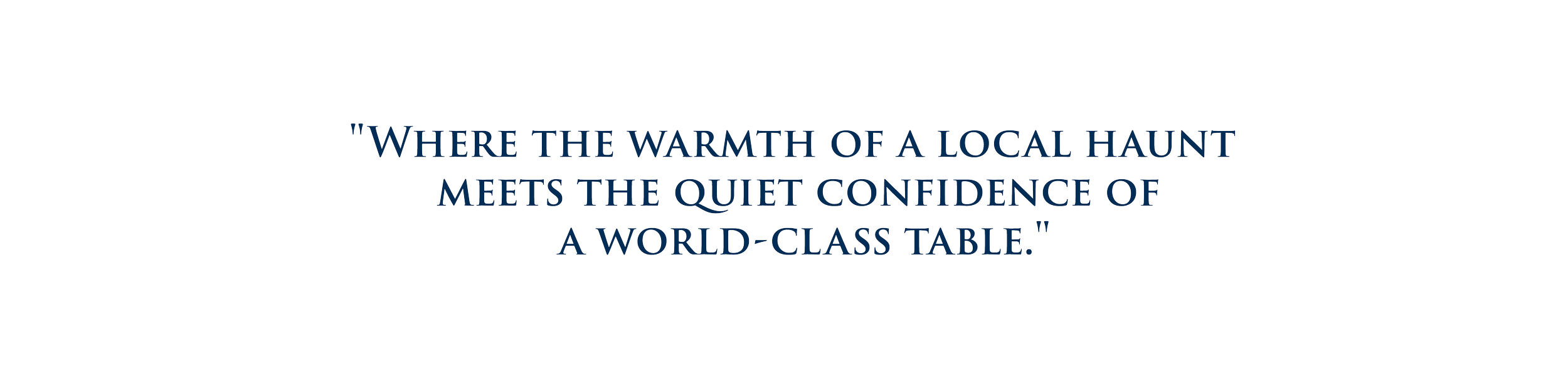 Inspirational quote about a world-class table against a black background