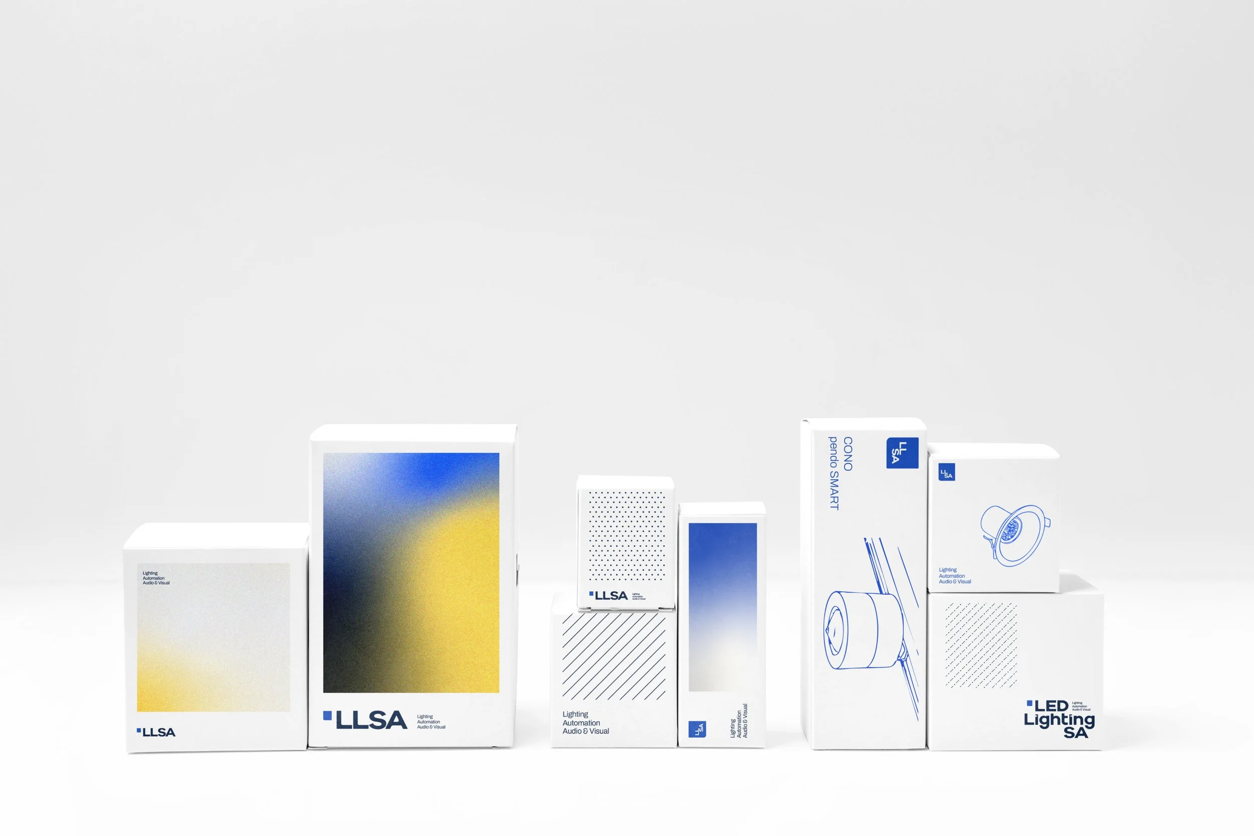 Various retail boxes for LLSA LED lighting and automation products arranged on a white surface against a plain white background.