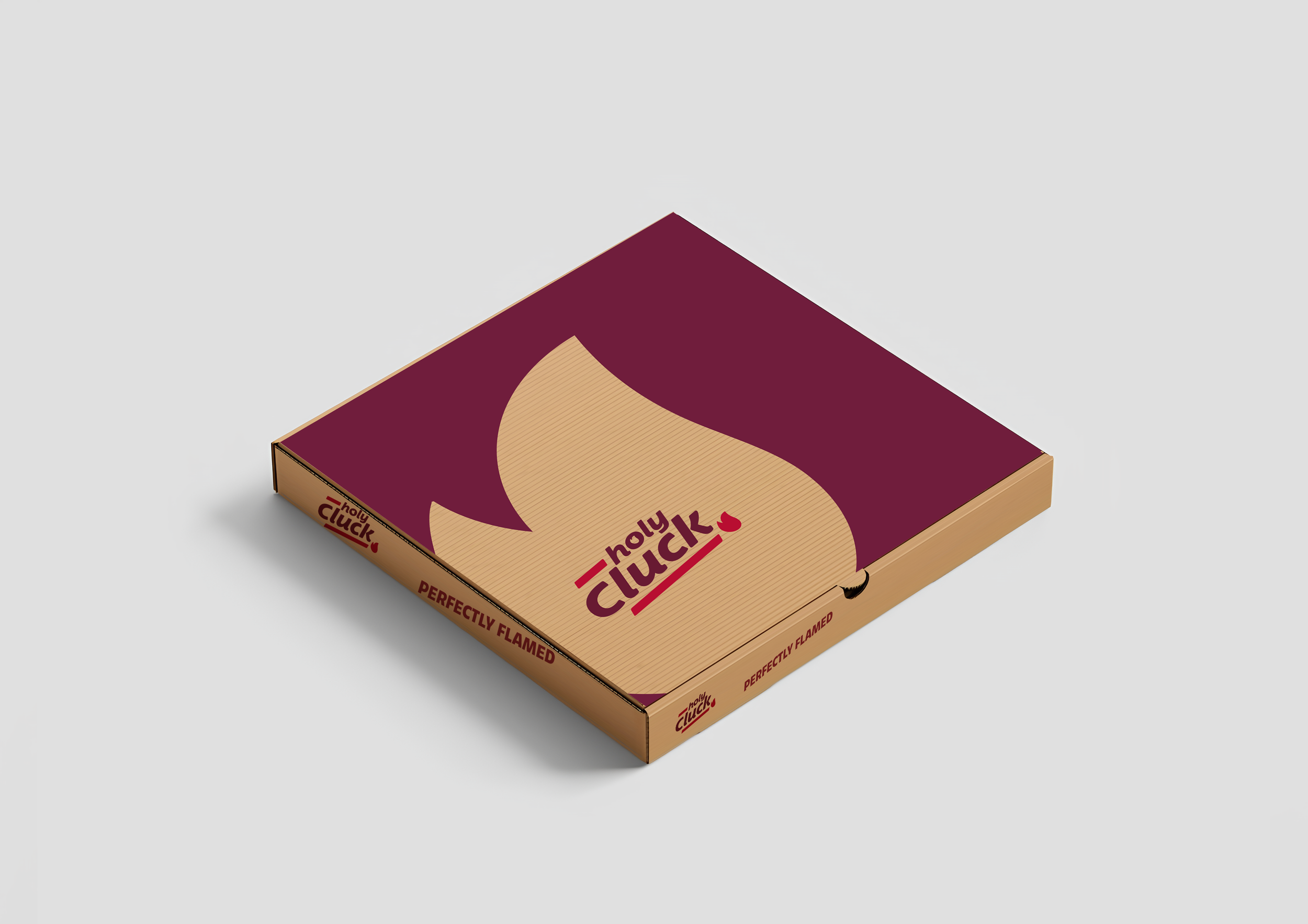 Box of Holy Cluck chicken wings with maroon and beige packaging