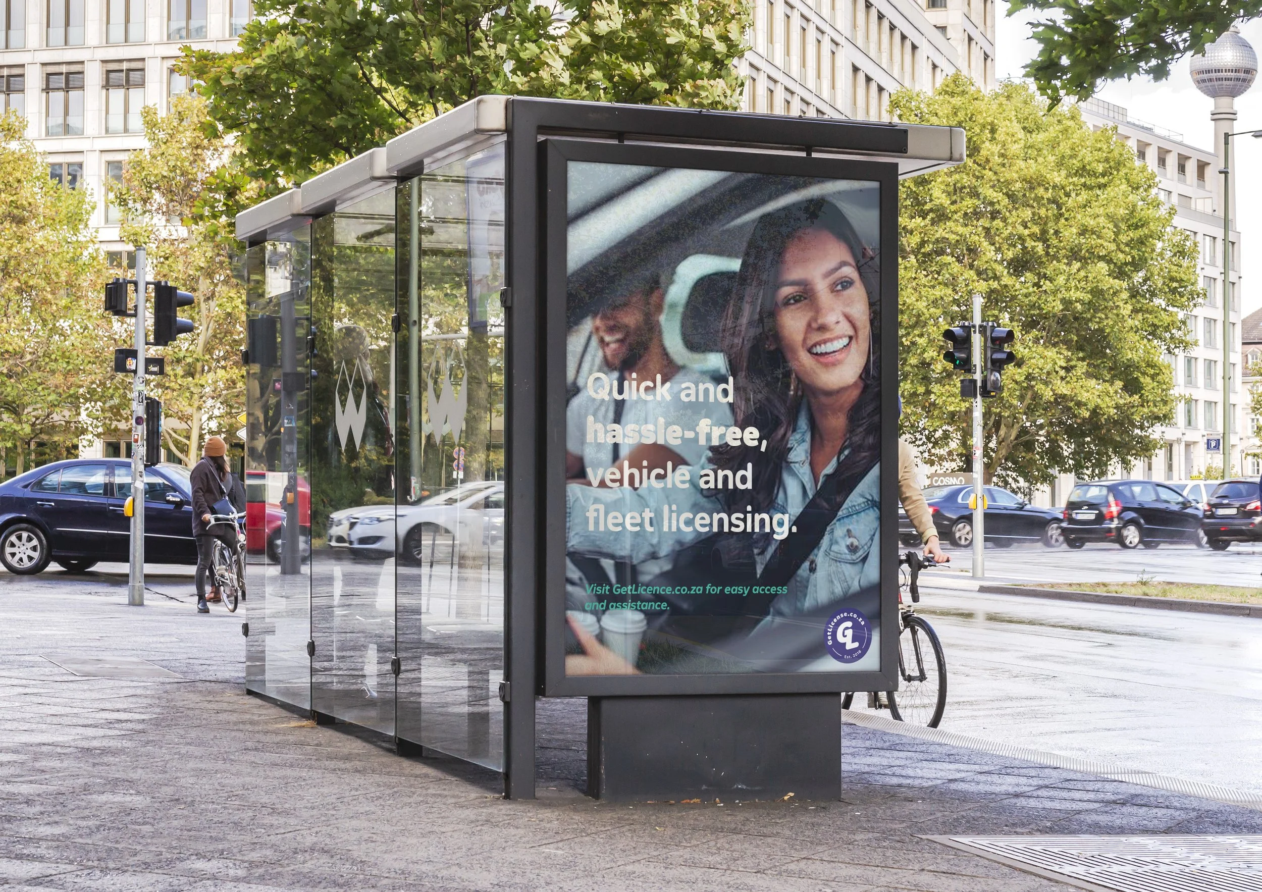 GetLicense.co.za outdoor billboard on a bus stop adverting the hassle-free vehicle license renewal process on the online portal.