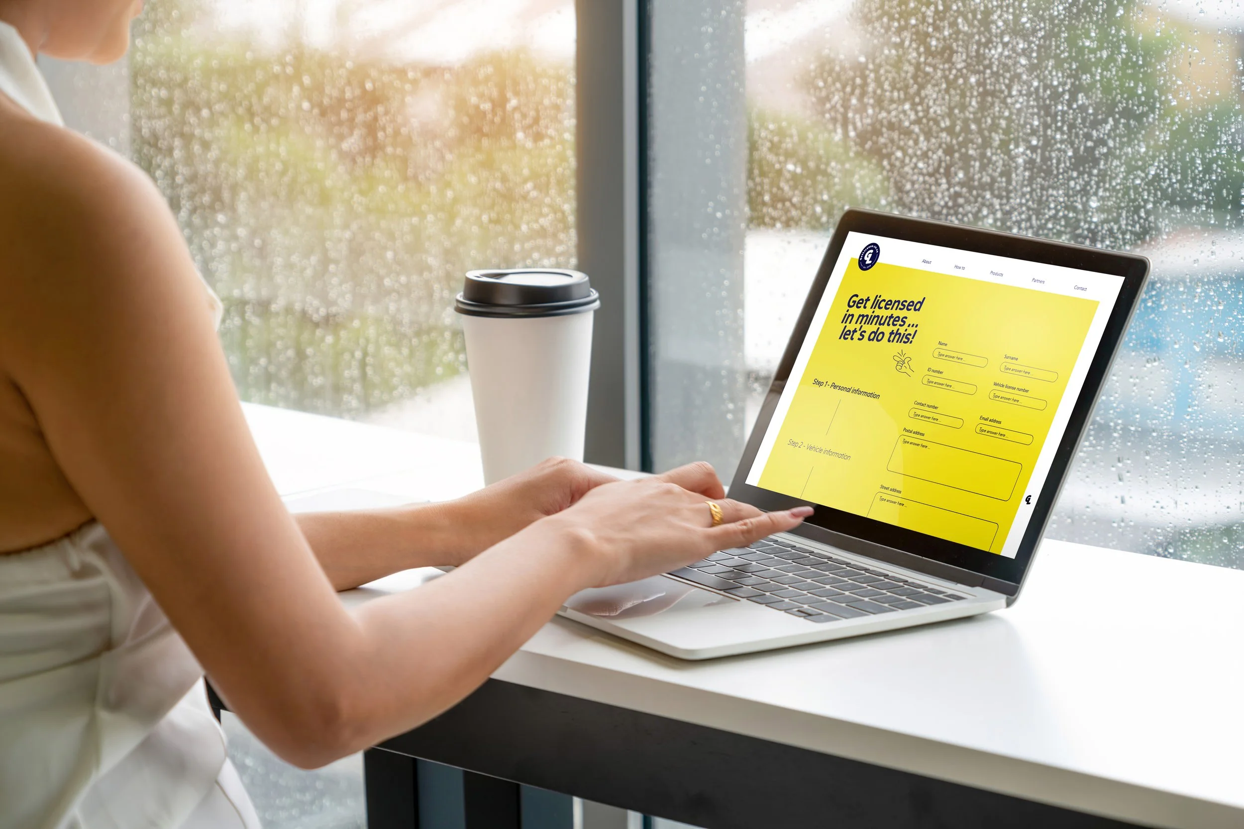Satisfied GetLicense.co.za customer browsing the newly branded website portal for convenient service and brand engagement.